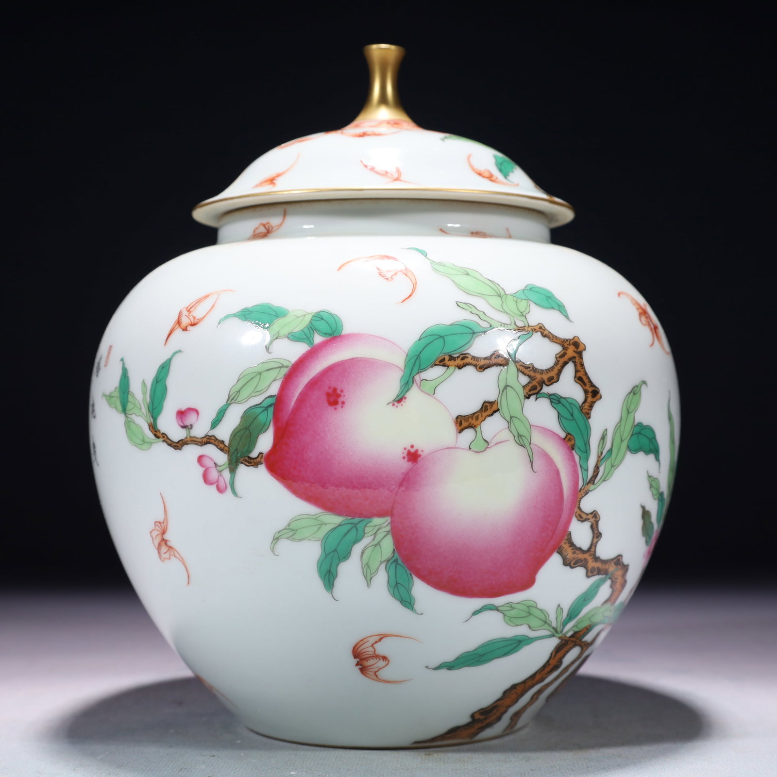 An Exquisite Famille-Rose Painted Gold Bats and Peach Pattern Jar with Cover,with poem: An Exquisite Famille-Rose Painted Gold Bats and Peach Pattern Jar with Cover,with poem,Qing Dynasty,China,Yongzheng Four-character Mark,Size:7.1inx9.1in,Weight:1600g