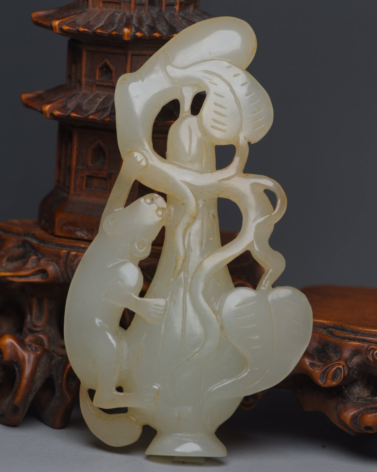 An Exquisite White Jade Squirrel Patten Pendant: An Exquisite White Jade Squirrel Patten Pendant,Qing Dynasty,China,Size:3.6inx2inx0.5in,Weight:55g 白玉松鼠纹牌,中国清代