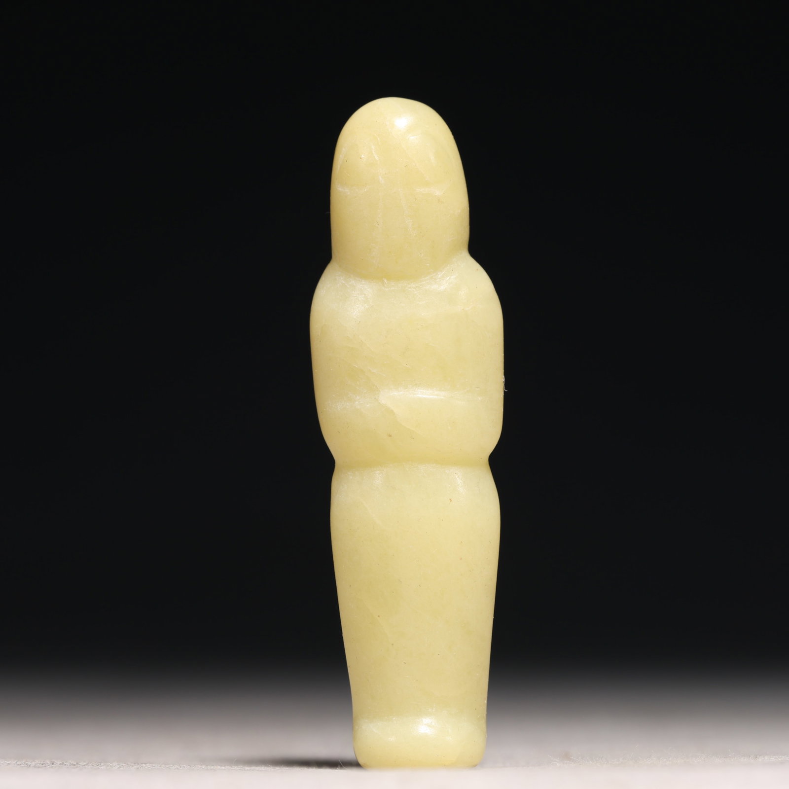 An Archaic Hongshan Culture Yellow Jade Pendant: An Archaic Hongshan Culture Yellow Jade Pendant,Ancient Time, China,Size:0.8inx2.7in Weight:21g 红山文化黄玉挂件,新石器时期