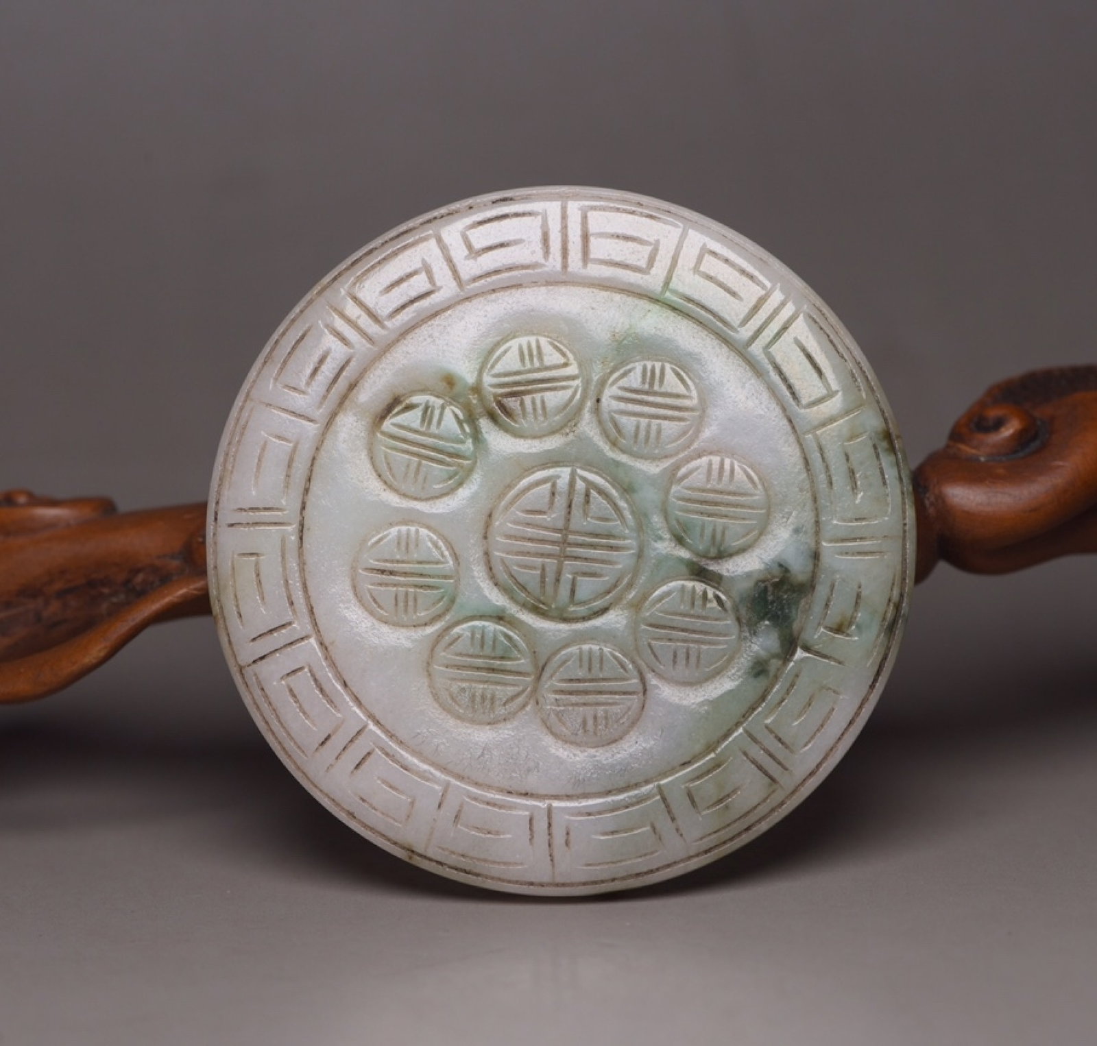 An Exquisite Jadeite Bats and Peach Pattern Buckle: An Exquisite Jadeite Bats and Peach Pattern Buckle,Qing Dynasty,China,Size:2.2inx2.2inx0.6in,Weight:50g