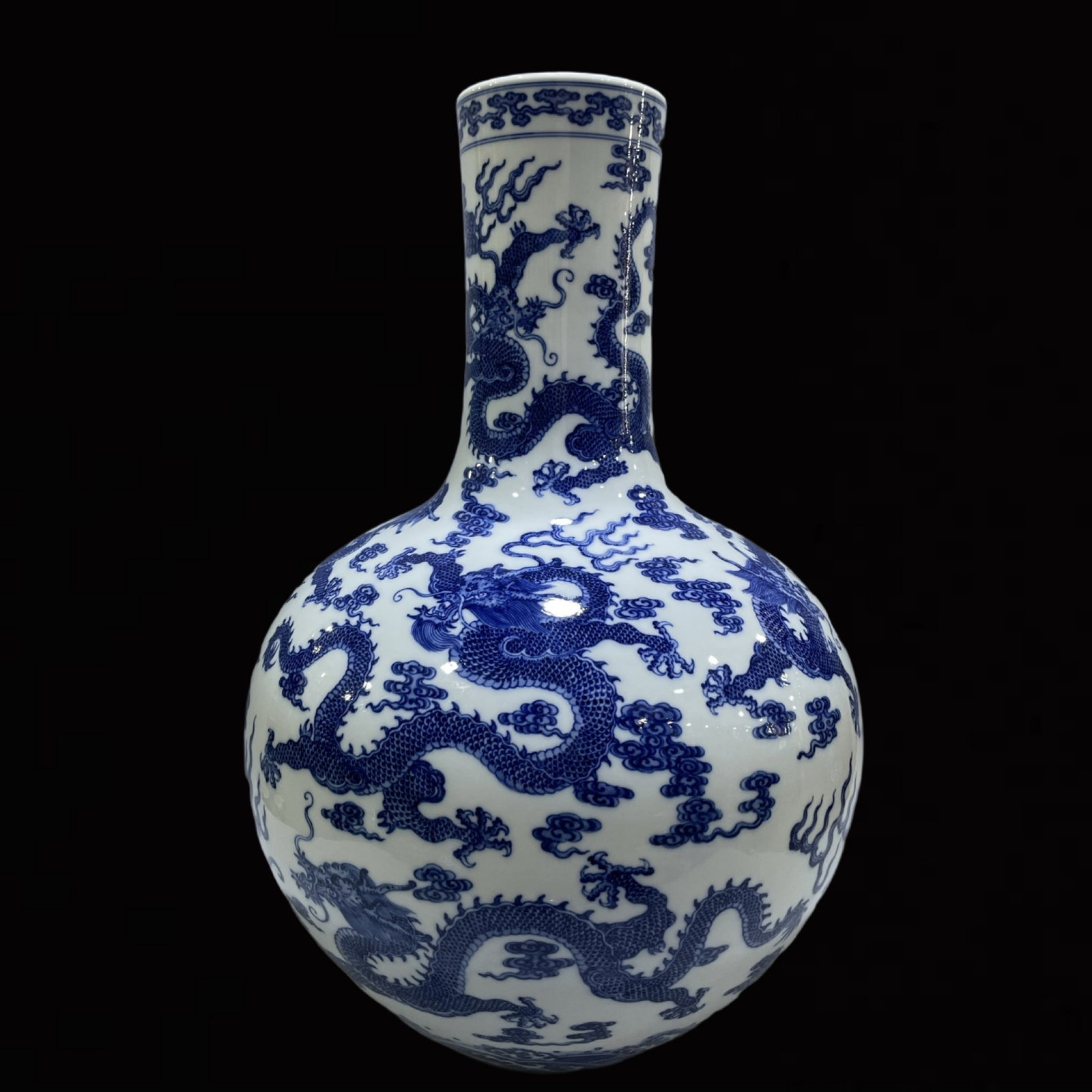A Huge Blue and White Auspicious Cloud and Dragon Pattern Vase: A Huge Blue and White Auspicious Cloud and Dragon Pattern Vase,Qing Dynasty,China,Qianlong Six-character Mark,Size:22inx15in