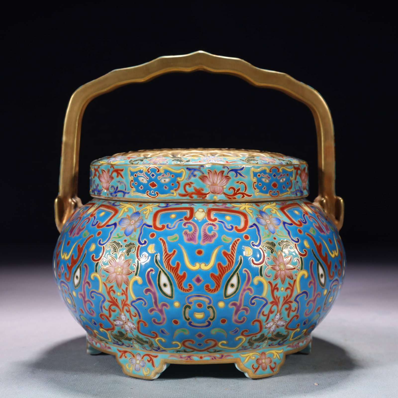 An Exquisite Green Ground Enamel Painted Gold Beast-Face Pattern Loop-Handled Jar: An Exquisite Green Ground Enamel Painted Gold Beast-Face Pattern Loop-Handled Jar,Qing Dynasty,China,Qianlong Four-character Mark,Size:6.7inx7.9in,Weight:1650g