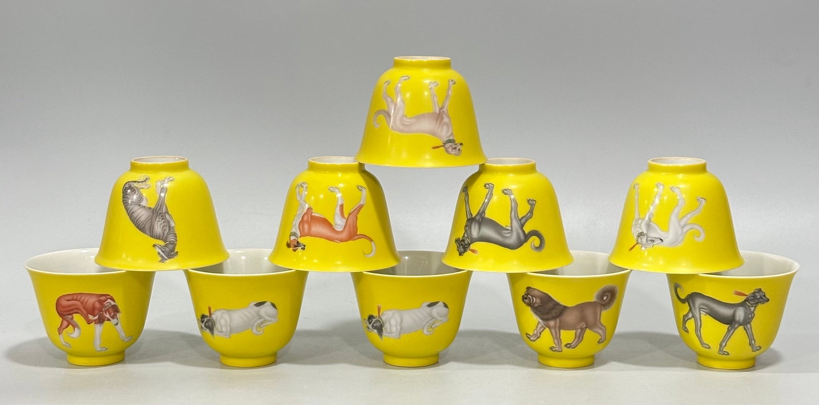 A Set of Fine Enamel Yellow Glazed Dog Pattern Cups,with poem: A Set of Fine Enamel Yellow Glazed Dog Pattern Cups,with poem,Qing Dynasty,China,Qianlong Four-character Mark,Size:2inx2.6in
