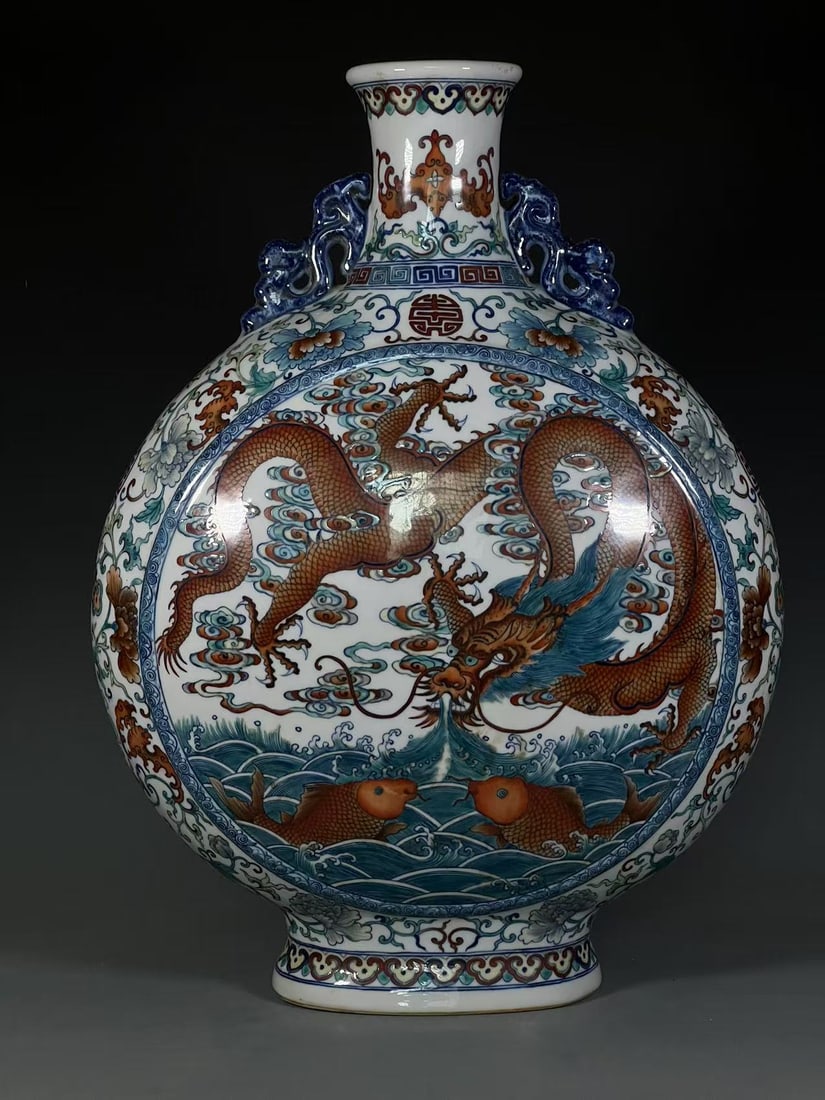 A Huge Blue and White Doucai Auspicious Cloud,Fish and Dragon Pattern Dragon-Ears Vase: A Huge Blue and White Doucai Auspicious Cloud,Fish and Dragon Pattern Dragon-Ears Vase,Qing Dynasty,China,Qianlong Six-character Mark,Size:22.5inx4.2inx8.1in