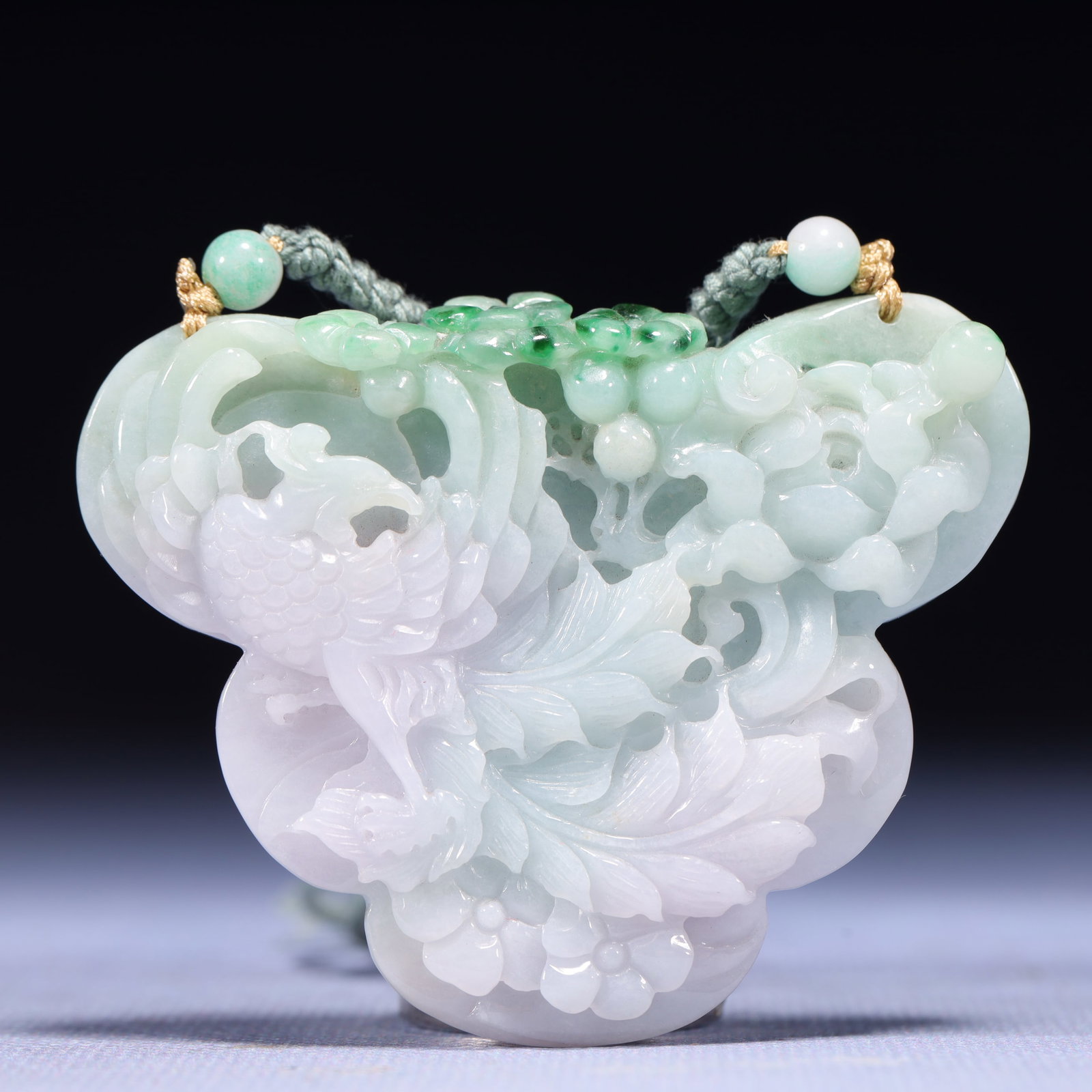 An Exquisite Jadeite Phoenix Pattern Pendant: An Exquisite Jadeite Phoenix Pattern Pendant,Qing Dynasty,China,Size:2.8inx0.4inx2.2in,Weight:77g 翡翠凤纹挂件,中国清代