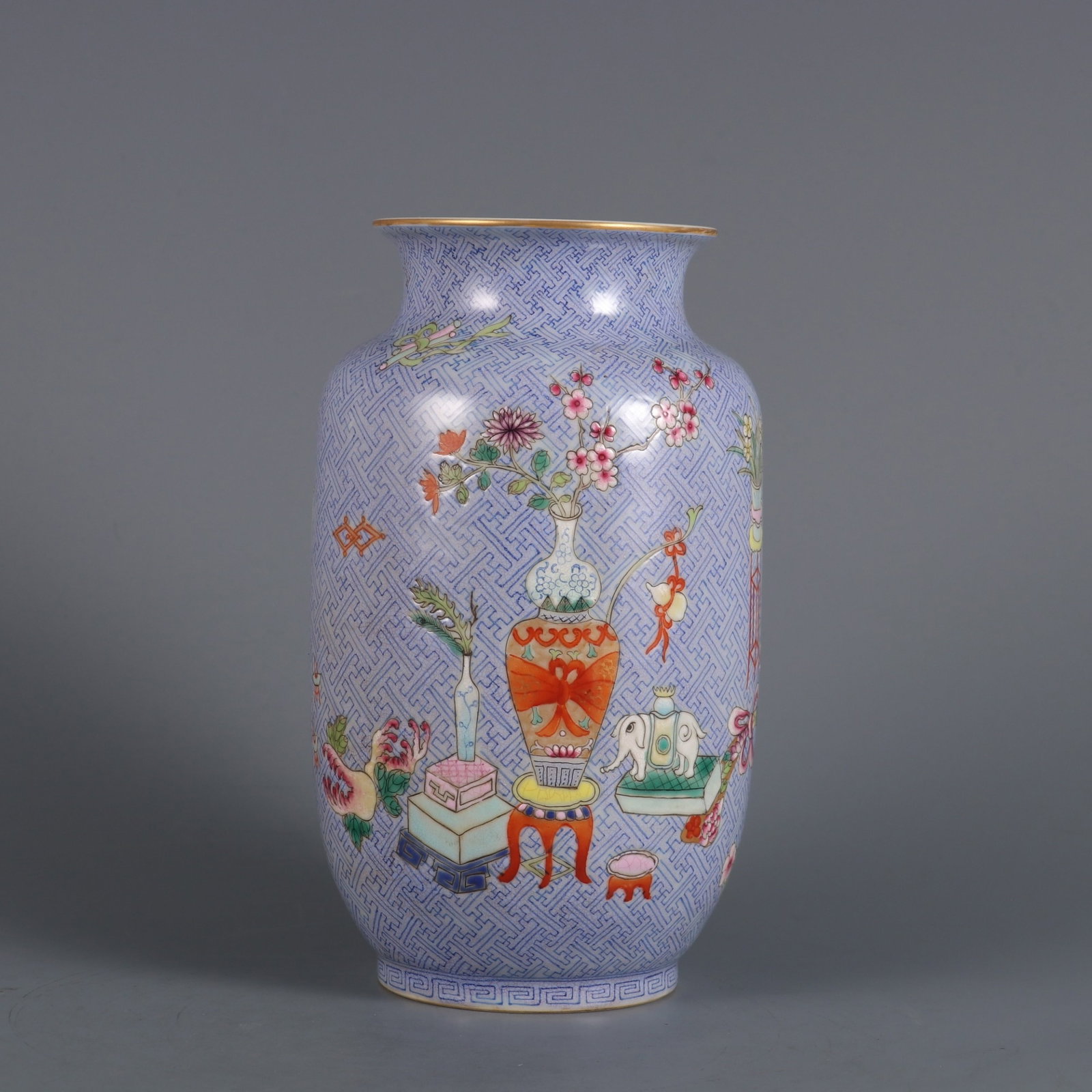An Exquisite Blue Ground Famille-Rose Flower Pattern Vase: An Exquisite Blue Ground Famille-Rose Flower Pattern Vase,Qing Dynasty,China,Qianlong Four-character Mark,Size:6.5inx3.7in 蓝地粉彩花卉纹瓶,中