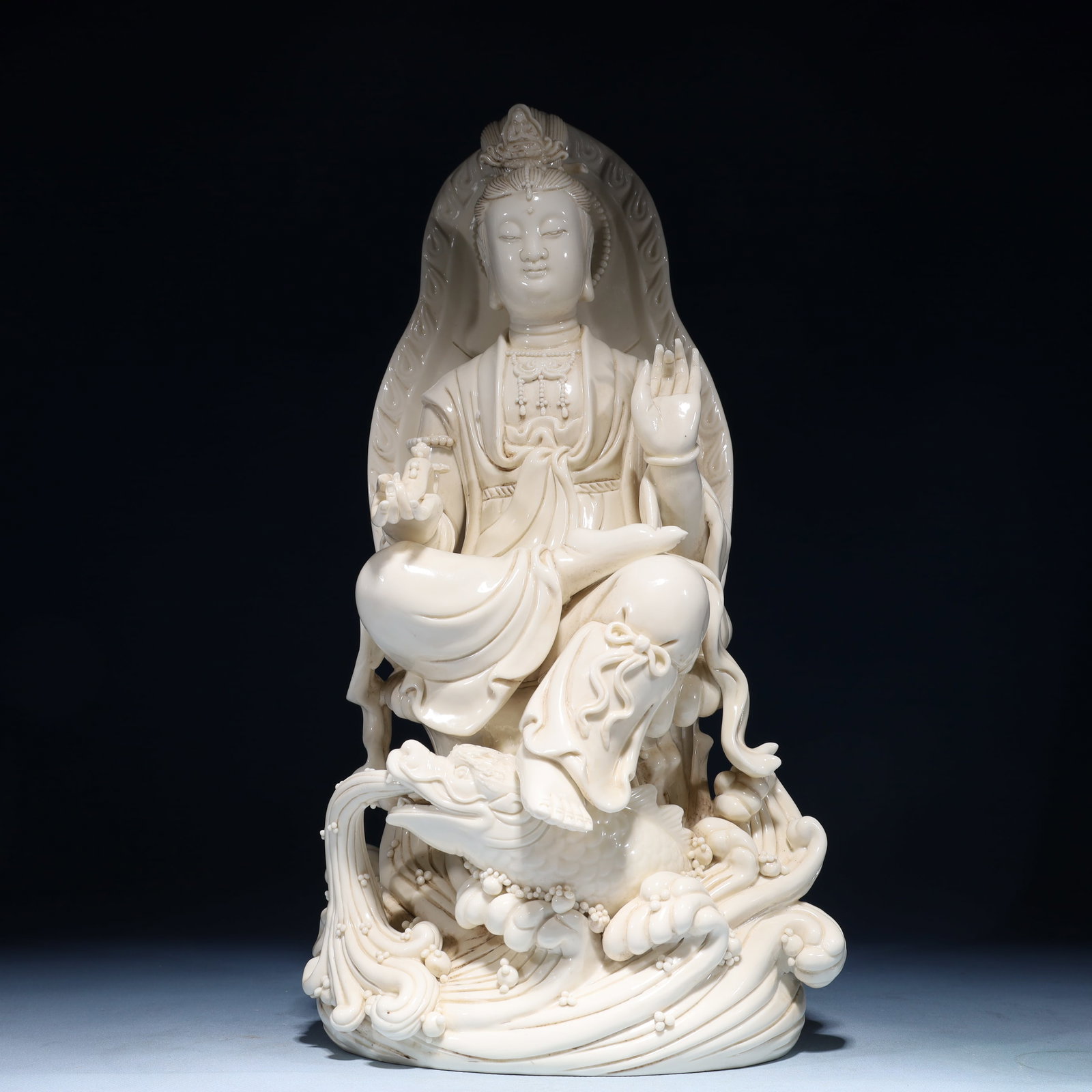 A Solemn Blance-De-Chine Statue of Avalokitesvara: A Solemn Blance-De-Chine Statue of Avalokitesvara Blance-De-Chine Statue of Avalokitesvara,Ming Dynasty,China,He Chaozong Mark,Size:9.3inx7.9inx17.3in,Weight:5750g 德化瓷观&