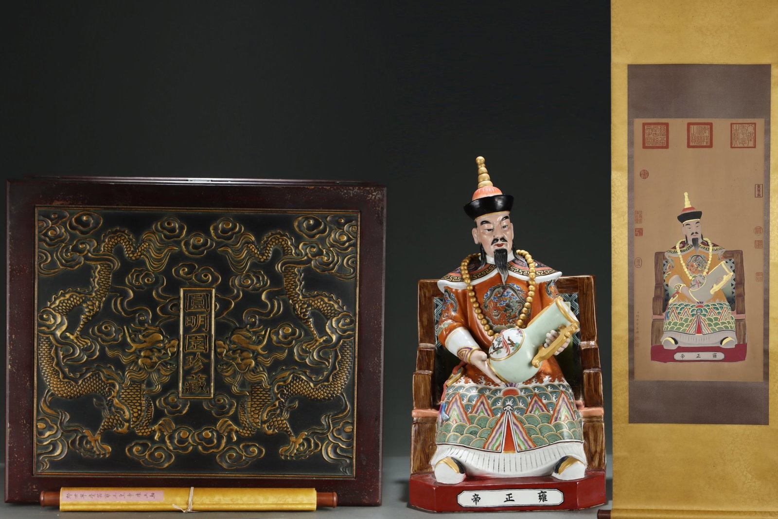 A Huge Famille-Rose Figure Ornament,with Chinese Vertical Scroll Ink Painting on Silk: A Huge Famille-Rose Figure Ornament,with Chinese Vertical Scroll Ink Painting on Silk,Qing Dynasty,China,Size:(Silk)32.5inx16.1in,(Porcelain)26.8inx15in 粉彩人物摆件