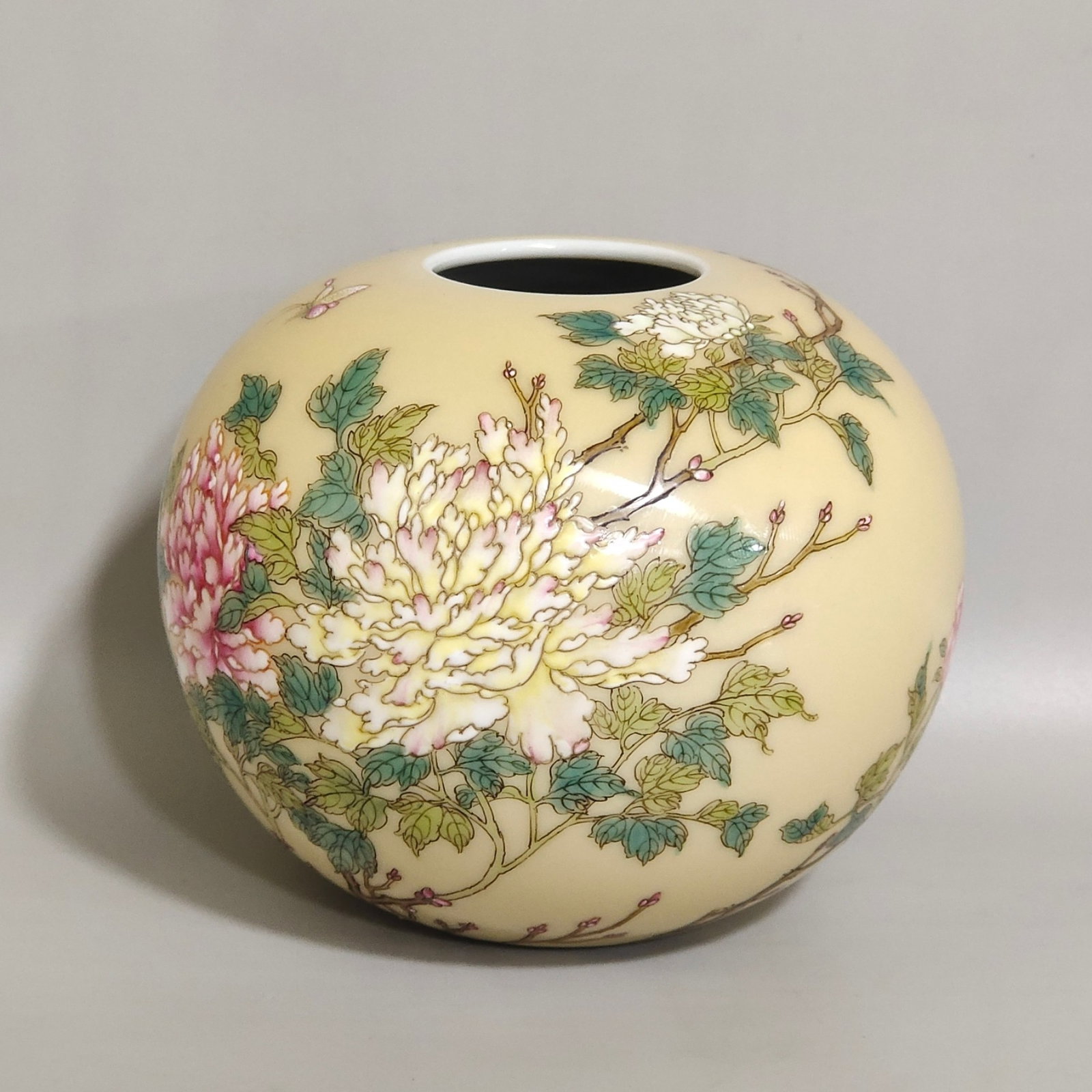 An Exquisite Yellow Ground Famille-Rose Flower and Butterfly Pattern Water Pot: An Exquisite Yellow Ground Famille-Rose Flower and Butterfly Pattern Water Pot,Qing Dynasty,China,Yongzheng Four-character Mark,Size:3.3inx3.7in 黄地粉彩花卉蝴