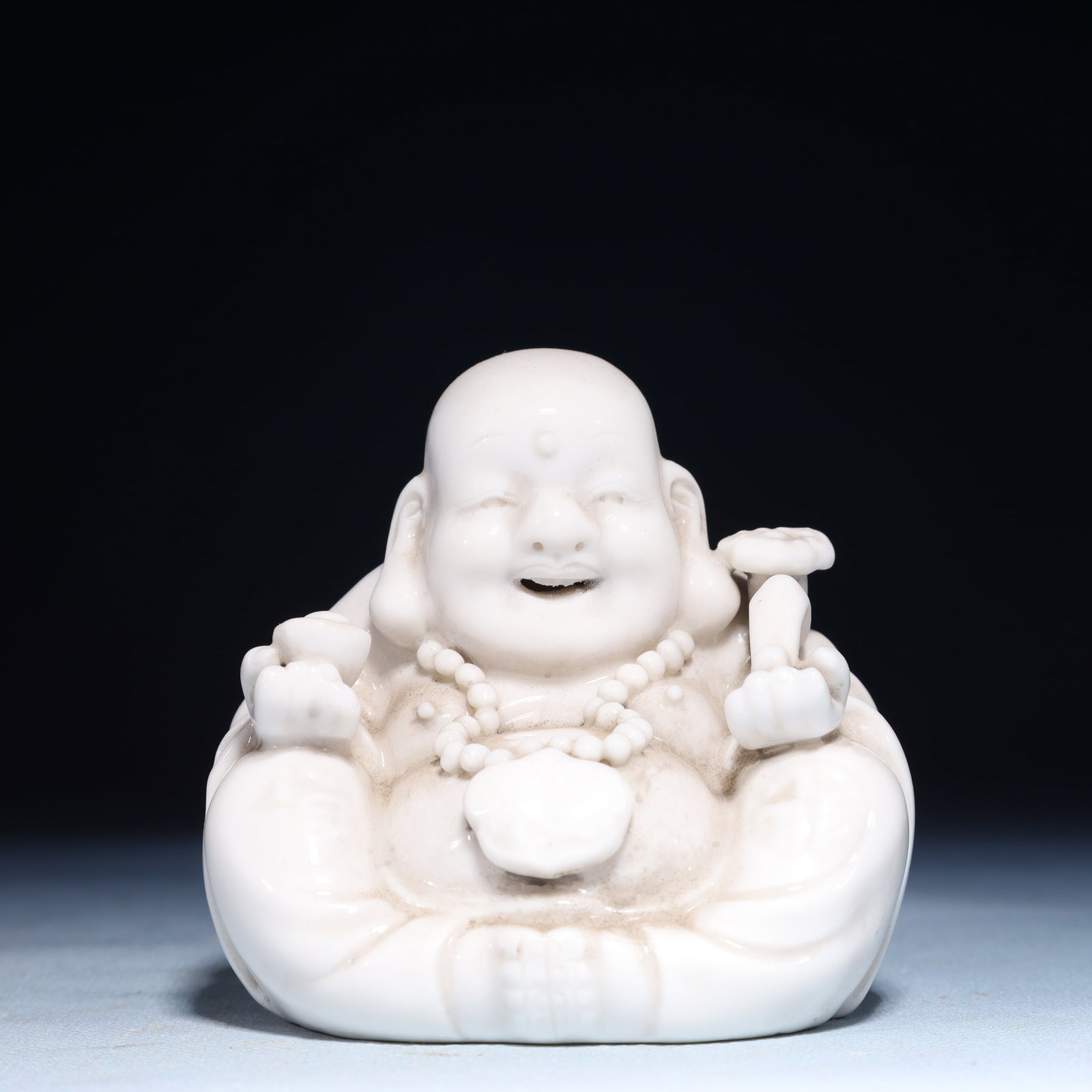 A Solemn Blance-De-Chine Statue of Maitreya Buddha: A Solemn Blance-De-Chine Statue of Maitreya Buddha Blance-De-Chine Statue of Maitreya Buddha,Ming Dynasty,China,Size:3.1inx2.8inx3in,Weight:150g 德化瓷弥勒佛像