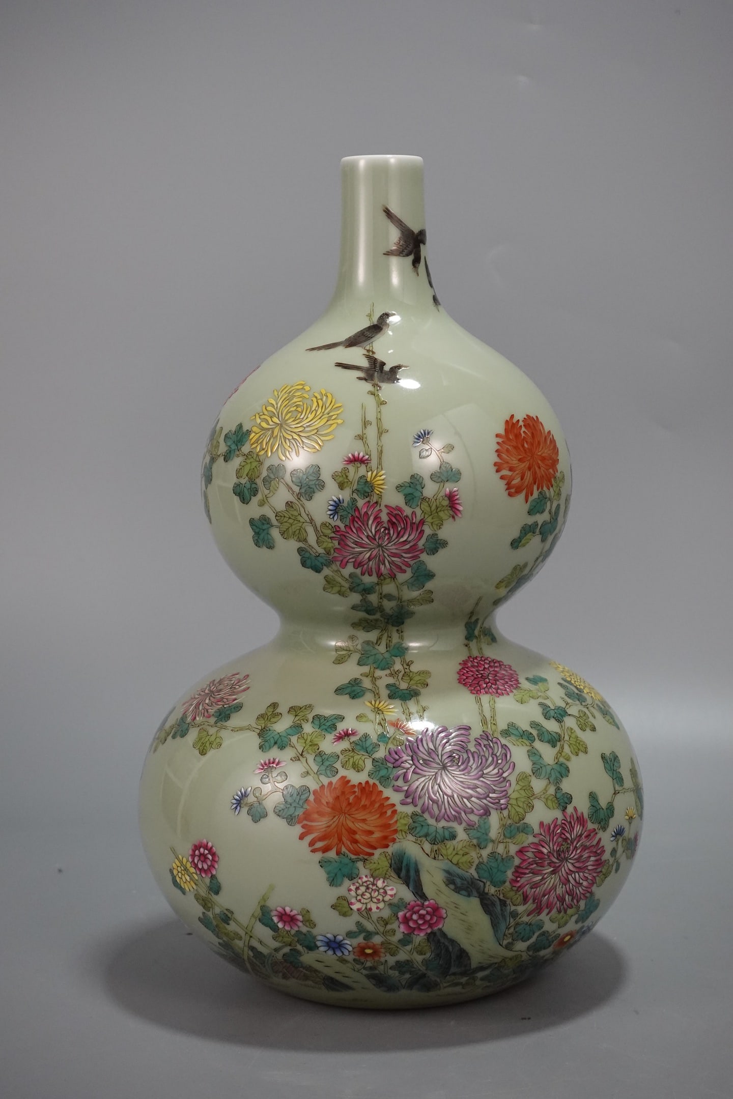 A Rare Celadon Glazed Famille-Rose Flower and Bird Pattern Gourd Vase,with poem (1 of 8)