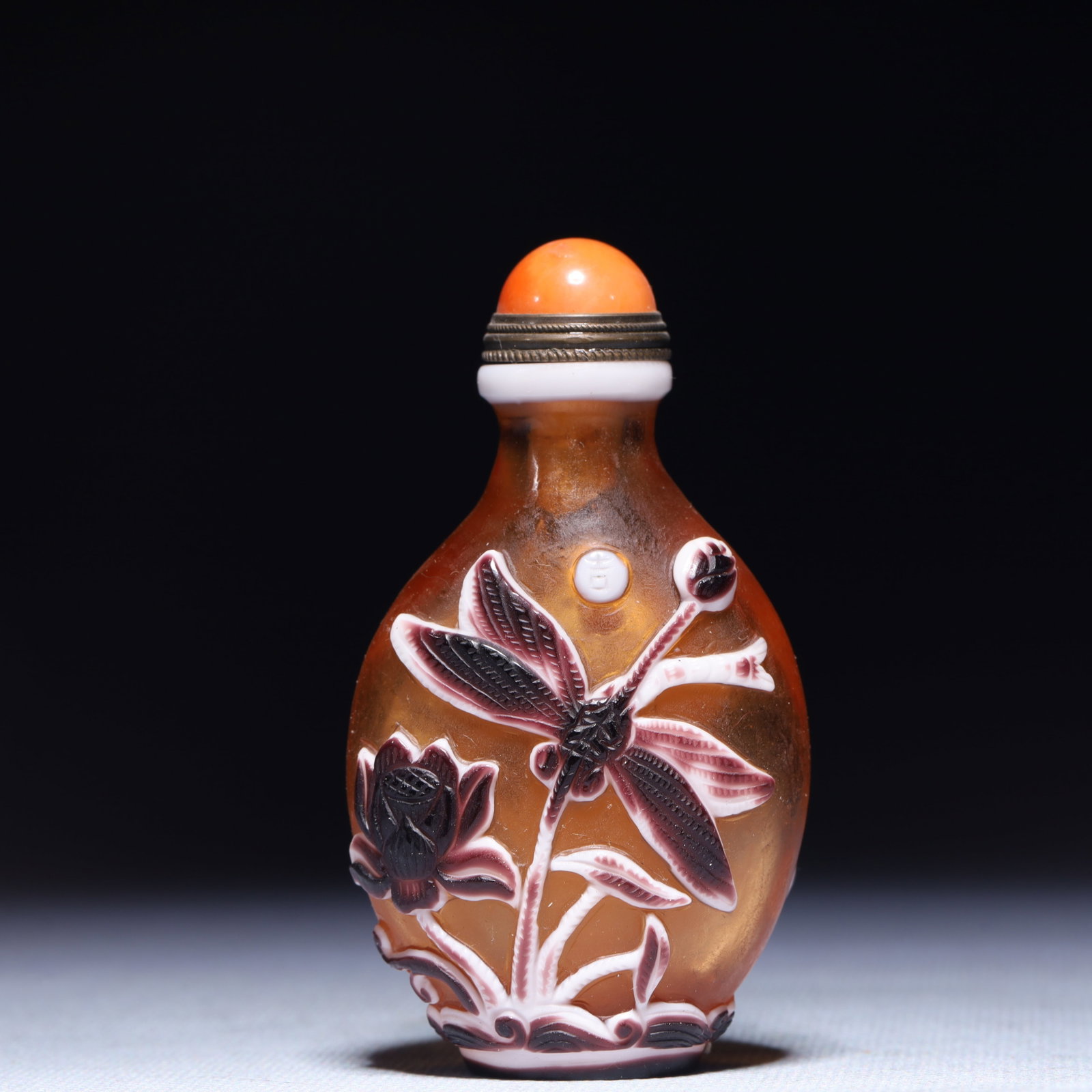An Exquisite Glass Lotus Dragonfly Pattern Snuff Bottle: An Exquisite Glass Lotus Dragonfly Pattern Snuff Bottle,Qing Dynasty,China,Qianlong Four-character Mark,Size:1.6inx1.2inx3.1in,Weight:80.1g