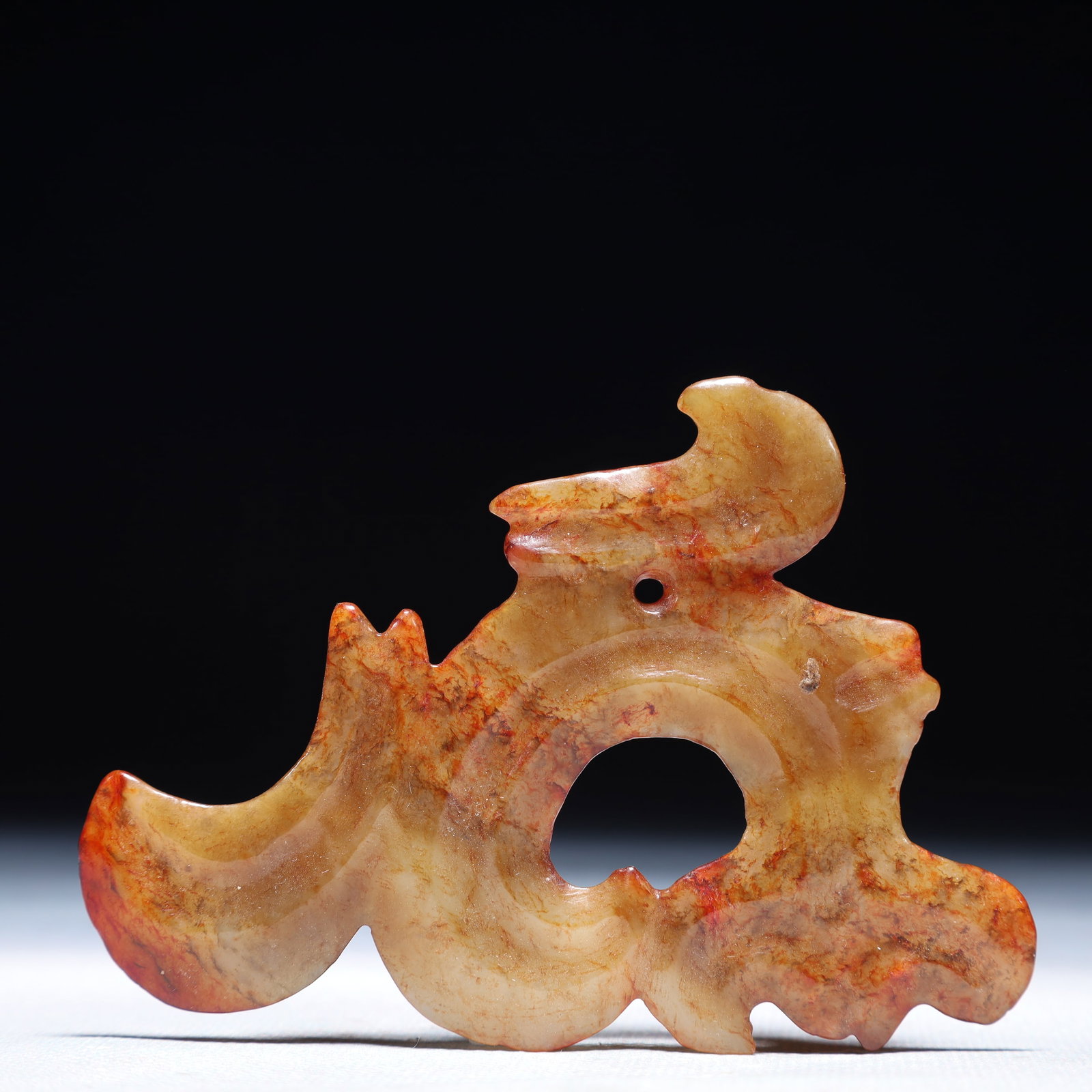 An Archaic Hongshan Culture White Jade Pendant: An Archaic Hongshan Culture White Jade Pendant,Ancient Time,China,Size:3.9inx2.8in,Weight:36.5g