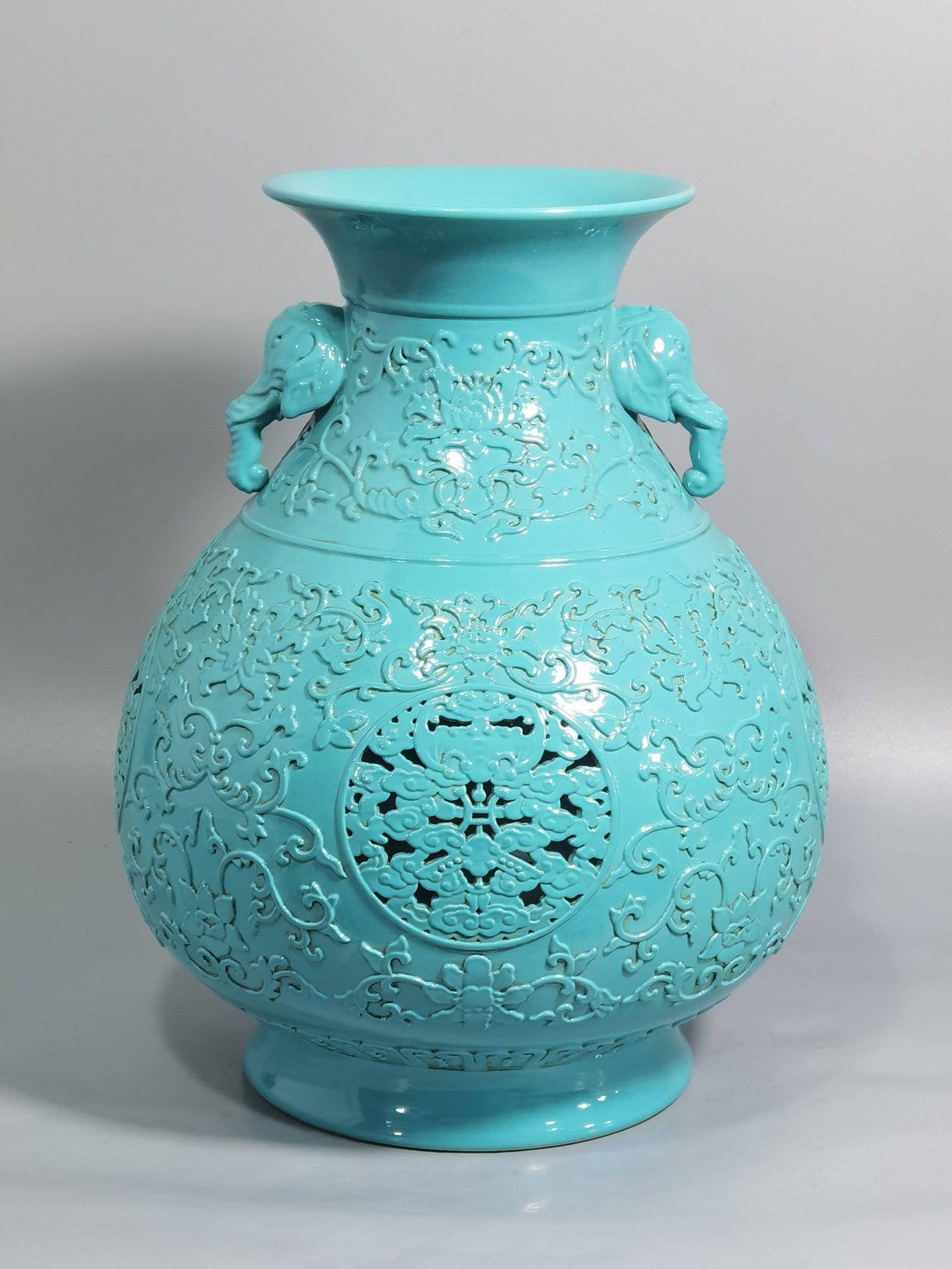 An Exquisite Turquoise Glazed Lotus Pattern Elephant-Ears Vase: An Exquisite Turquoise Glazed Lotus Pattern Elephant-Ears Vase,Qing Dynasty,China,Qianlong Six-character Mark,Size:11.2inx8.7in 松石绿釉缠枝莲纹象