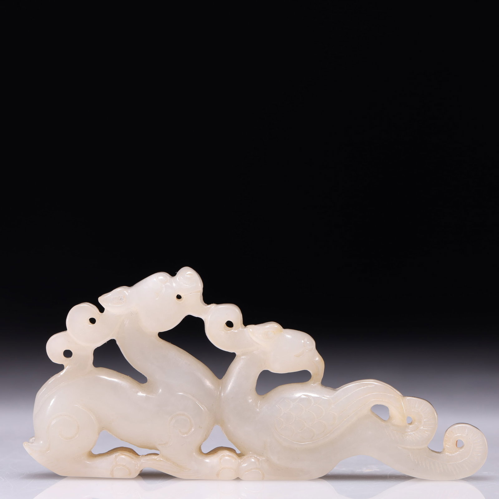 An Exquisite White Jade Beast Ornament: An Exquisite White Jade Beast Ornament,Qing Dynasty,China,Size:3.7inx0.4inx1.8in,Weight:68g 白玉兽摆件,中国清代