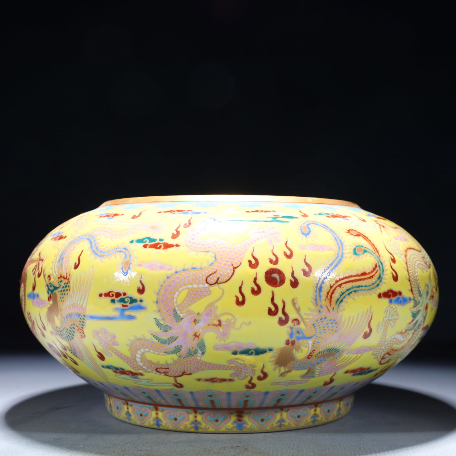 An Exquisite Yellow Ground Famille-Rose Painted Gold Dragon and Phoenix Pattern Jar: An Exquisite Yellow Ground Famille-Rose Painted Gold Dragon and Phoenix Pattern Jar,Qing Dynasty,China,Yongzheng Four-character Mark,Size:10.2inx5.5in,Weight:2650g 黄地粉彩