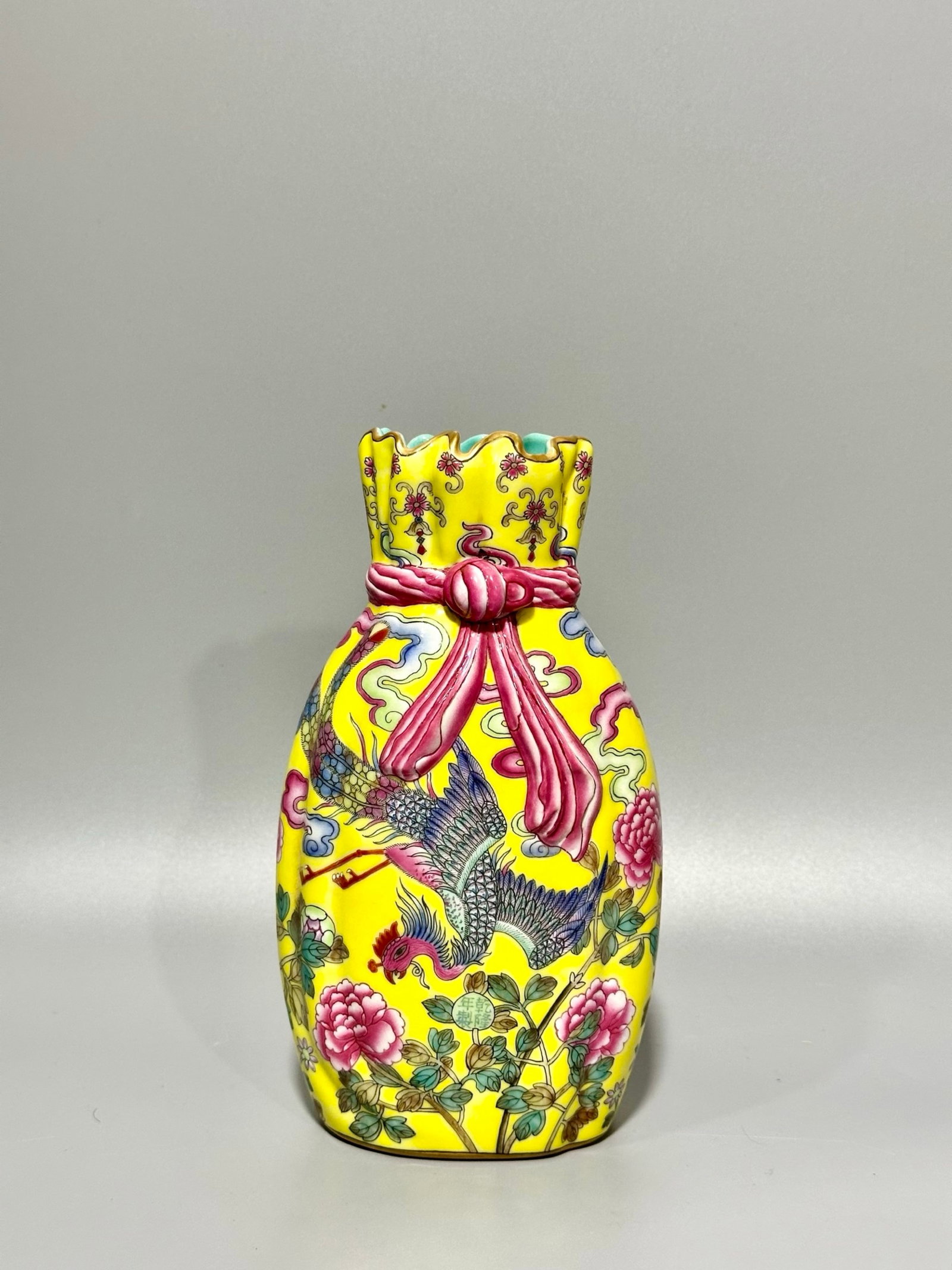 An Exquisite Yellow Ground Famille-Rose Flower and Phoenix Pattern Vase: An Exquisite Yellow Ground Famille-Rose Flower and Phoenix Pattern Vase,Qing Dynasty,China,Qianlong Four-character Mark,Size:7.4inx4.3in