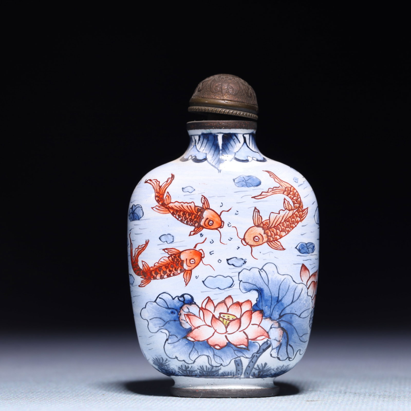 An Exquisite Painted Enamel Lotus Fish Pattern Snuff Bottle: An Exquisite Painted Enamel Lotus Fish Pattern Snuff Bottle,Qing Dynasty,China,Qianlong Four-character Mark,Size:1.6inx0.8inx2.8in,Weight:67g 画珐琅莲花鱼纹&#