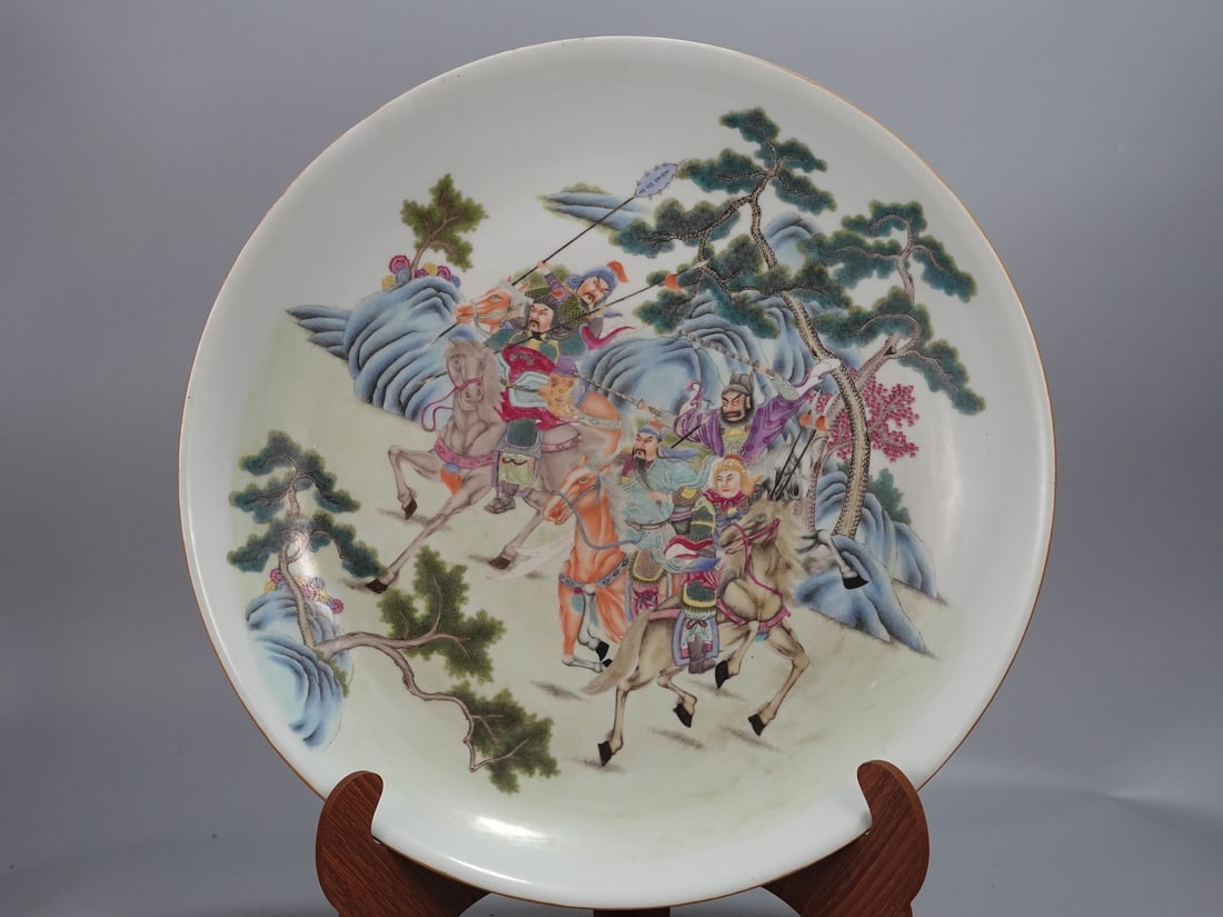 A Huge Famille-Rose Yellow Ground Landscape and Figure Pattern Plate: A Huge Famille-Rose Yellow Ground Landscape and Figure Pattern Plate,Qing Dynasty,China,Qianlong Six-character Mark,Size:3.7inx20.1in