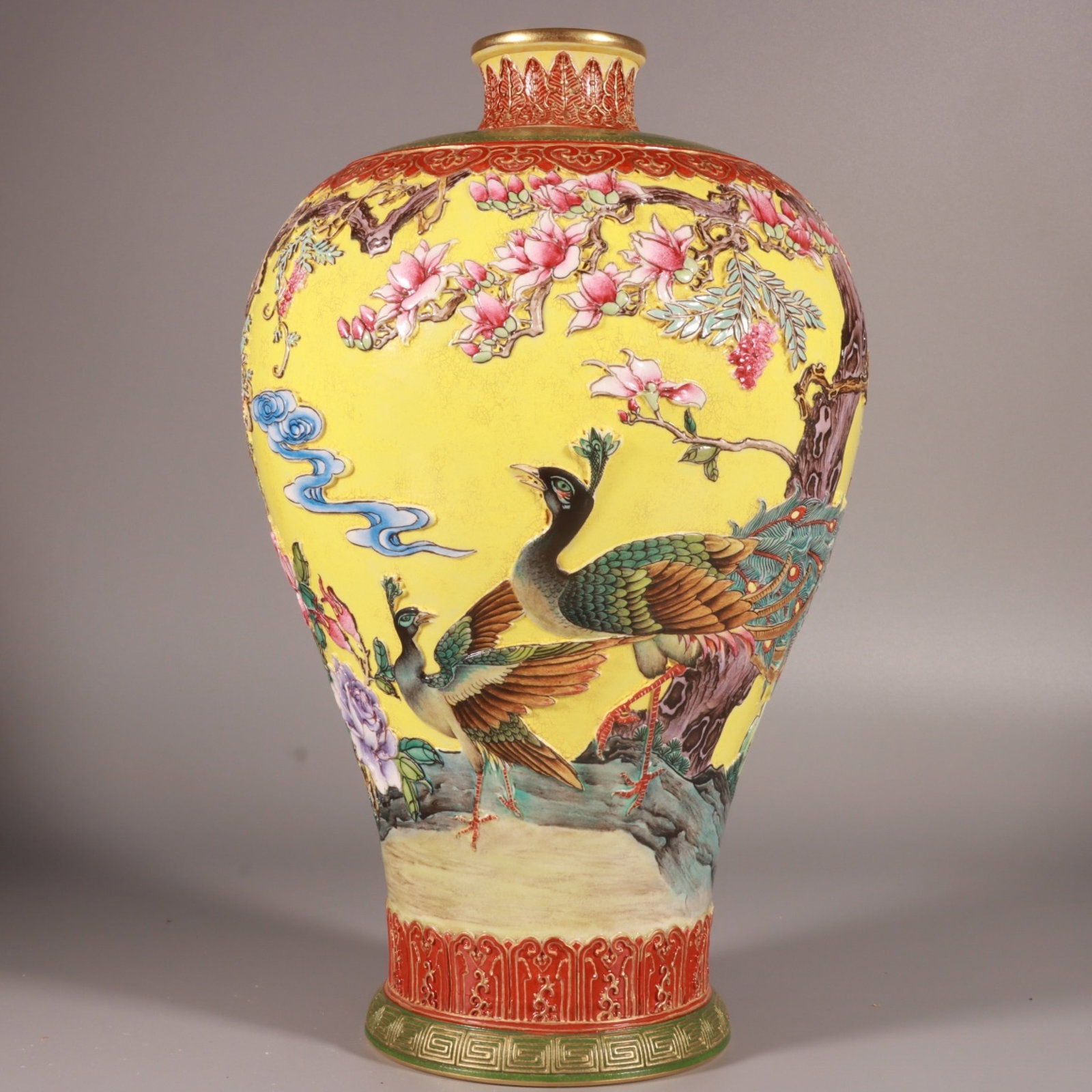 An Exquisite Yellow Ground Enamel Painted Gold Flower and Peacock Pattern Vase: An Exquisite Yellow Ground Enamel Painted Gold Flower and Peacock Pattern Vase,Qing Dynasty,China,Qianlong Six-character Mark,Size:11.3inx7.1in 黄地珐琅彩描金
