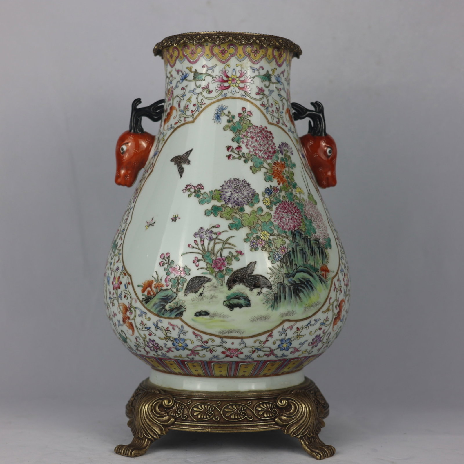 A Huge Famille-Rose Inlaid Bronze Flower and Bird Pattern Deer-Ears Vase: A Huge Famille-Rose Inlaid Bronze Flower and Bird Pattern Deer-Ears Vase,Qing Dynasty,China,Qianlong Six-character Mark,Size:16.1inx6.3inx10.2inx8.3in 粉彩镶铜花鸟&