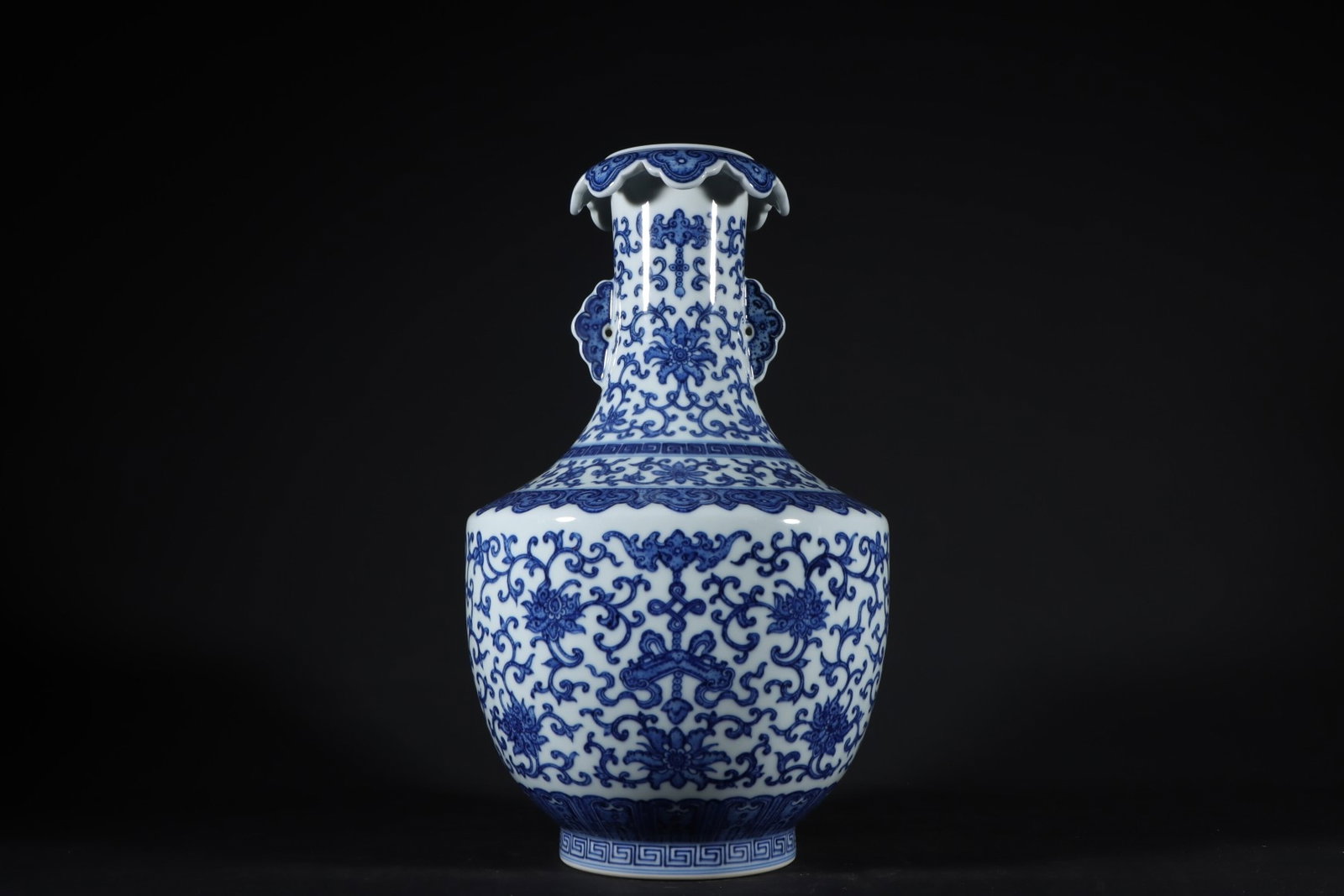 A Rare Blue and White Lotus Pattern Double-Ears Vase: A Rare Blue and White Lotus Pattern Double-Ears Vase,Qing Dynasty,China,Qianlong Six-character Mark,Size:11.8inx7.3in 青花缠枝莲纹双耳瓶,中&