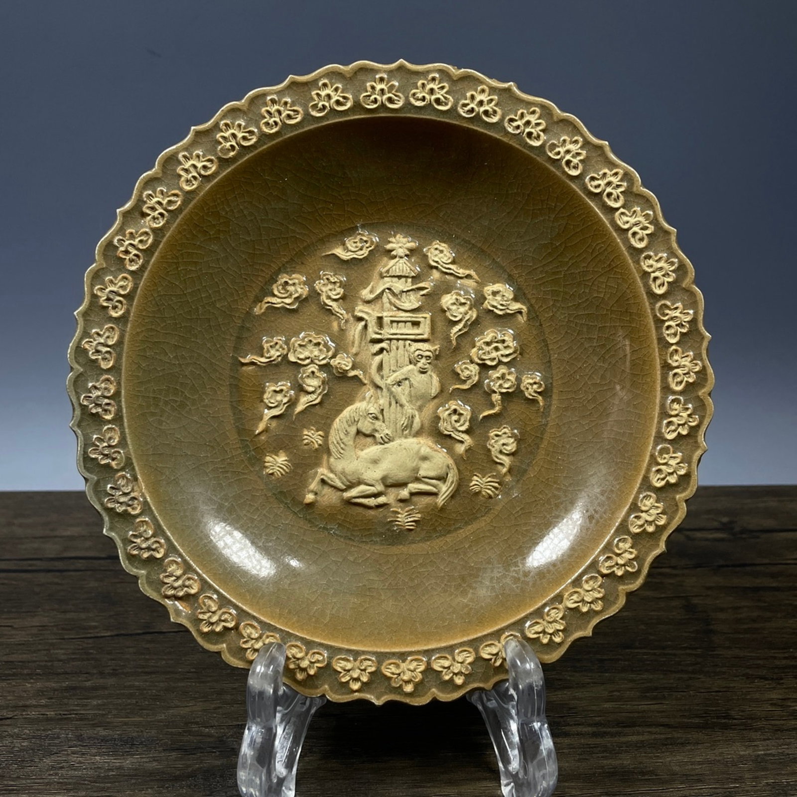 An Exquisite Longquan yao Auspicious Cloud and Dragon Pattern Plate: An Exquisite Longquan yao Auspicious Cloud and Dragon Pattern Plate,Song Dynasty,China,Size:1.2inx6.7in 龙泉窑祥云龙纹盘子,中国宋