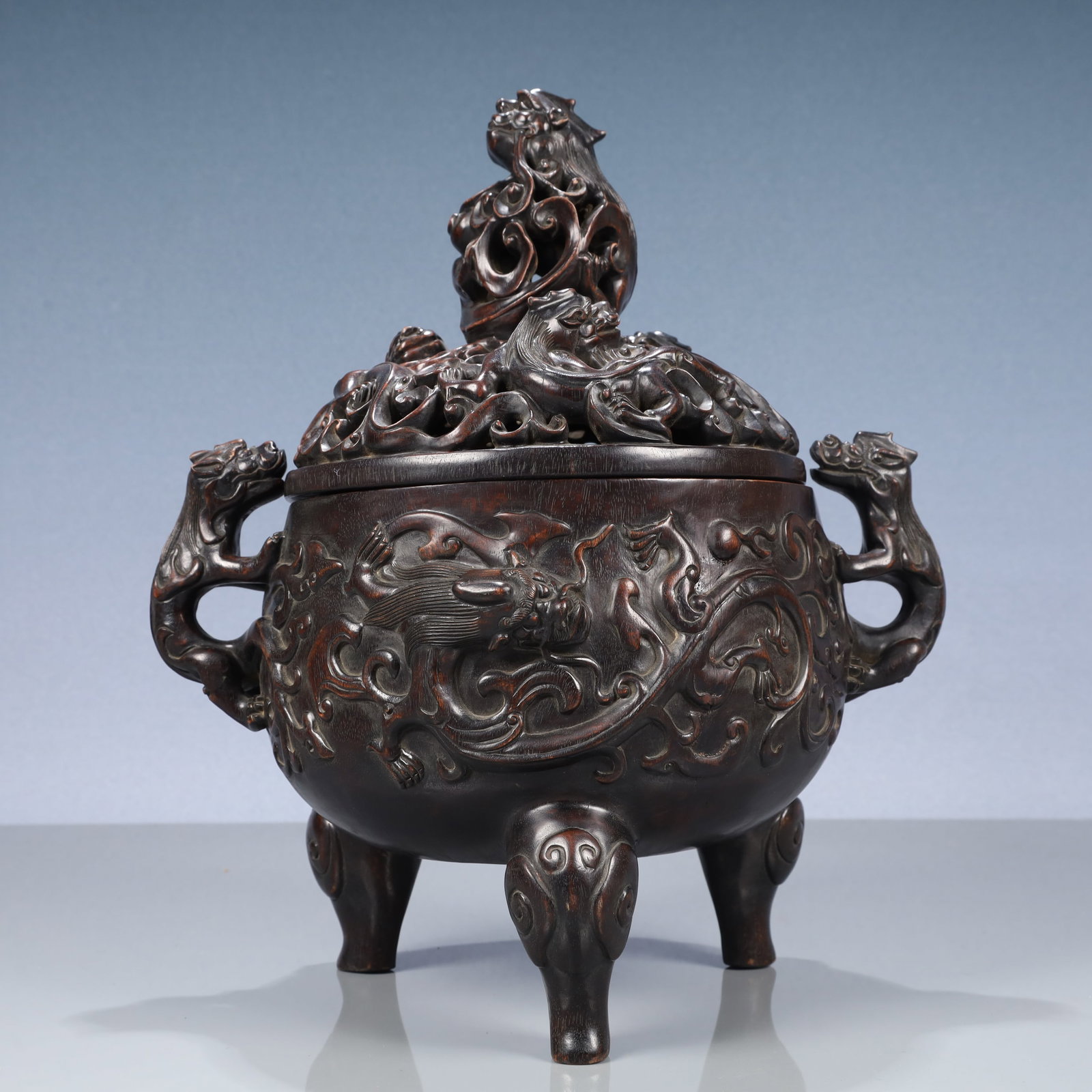 A Rare Zitanwood Chi-Dragon Pattern Beast-Ears Tripod Censer: A Rare Zitanwood Chi-Dragon Pattern Beast-Ears Tripod Censer,Qing Dynasty, China,Qianlong Four-character Mark,Size:11inx7.9inx13in,Weight:2350g 紫檀木螭龙纹兽