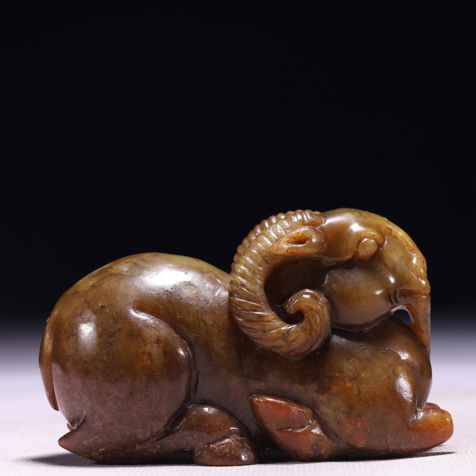 An Exquisite Archaic Jade Sheep Ornament (1 of 9)