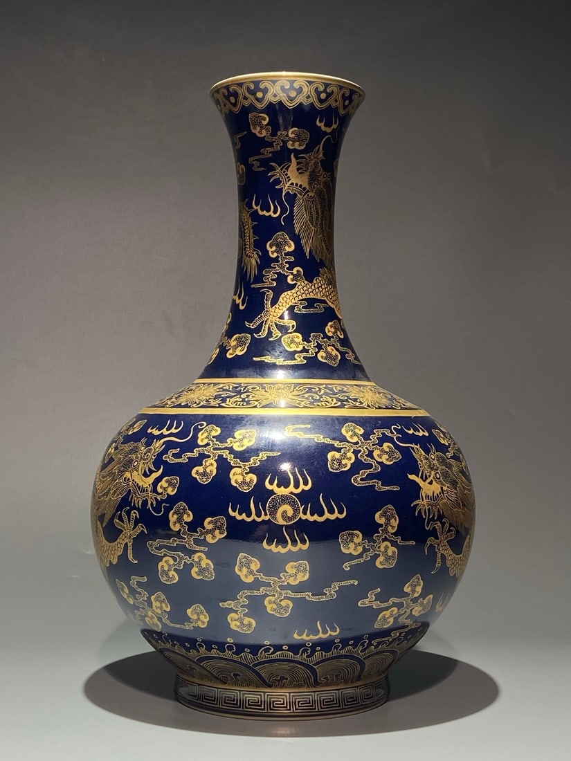 A Rare Ji Blue Glazed Painted Gold Auspicious Cloud and Dragon Pattern Vase: A Rare Ji Blue Glazed Painted Gold Auspicious Cloud and Dragon Pattern Vase,Qing Dynasty,China,Daoguang Six-character Mark,Size:15.7inx9.8in 霁蓝釉描金祥云