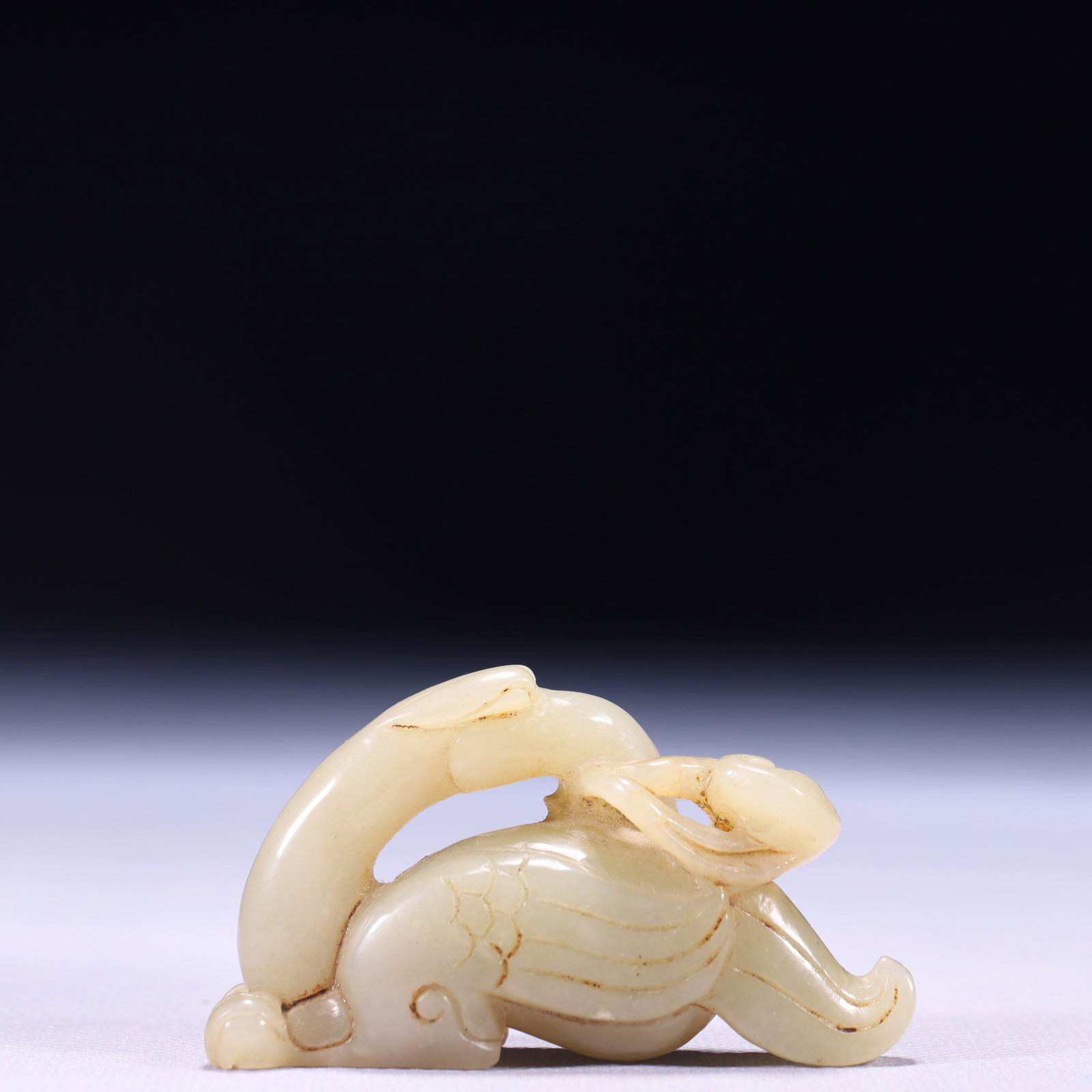 An Exquisite White Jade Phoenix Ornament: An Exquisite White Jade Phoenix Ornament,Qing Dynasty,China,Size:2.6inx0.6inx1.4in,Weight:57g 白玉凤摆件,中国清代
