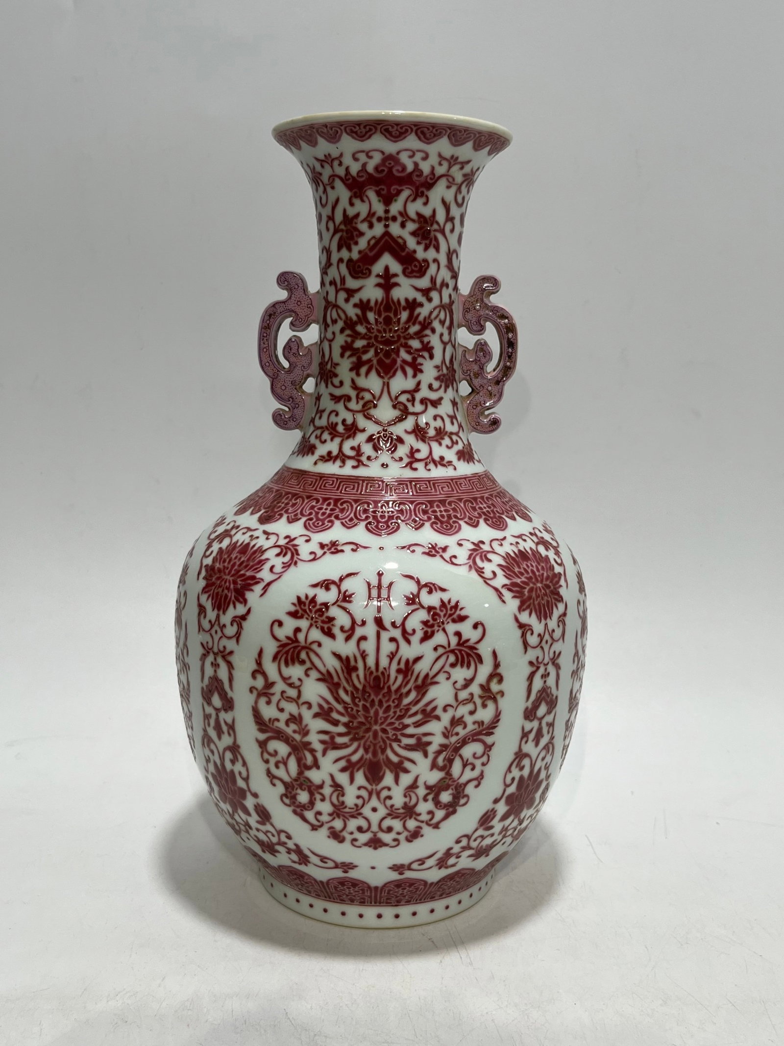 An Exquisite Iron-Red Color Lotus Pattern Double-Ears Vase: An Exquisite Iron-Red Color Lotus Pattern Double-Ears Vase,Qing Dynasty,China,Qianlong Six-character Mark,Size:11.4in 矾红彩缠枝莲纹双耳瓶,&
