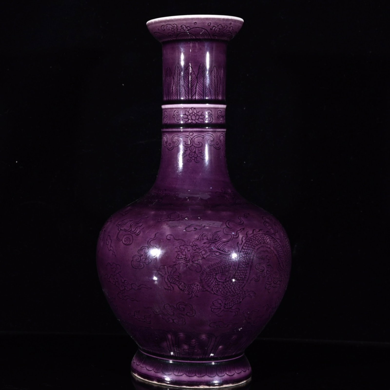 An Exquisite Purple Glazed Auspicious Cloud and Dragon Pattern Vase: An Exquisite Purple Glazed Auspicious Cloud and Dragon Pattern Vase,Qing Dynasty,China,Guangxu Six-character Mark,Size:9.8inx5.1in 紫釉祥云龙纹瓶,中