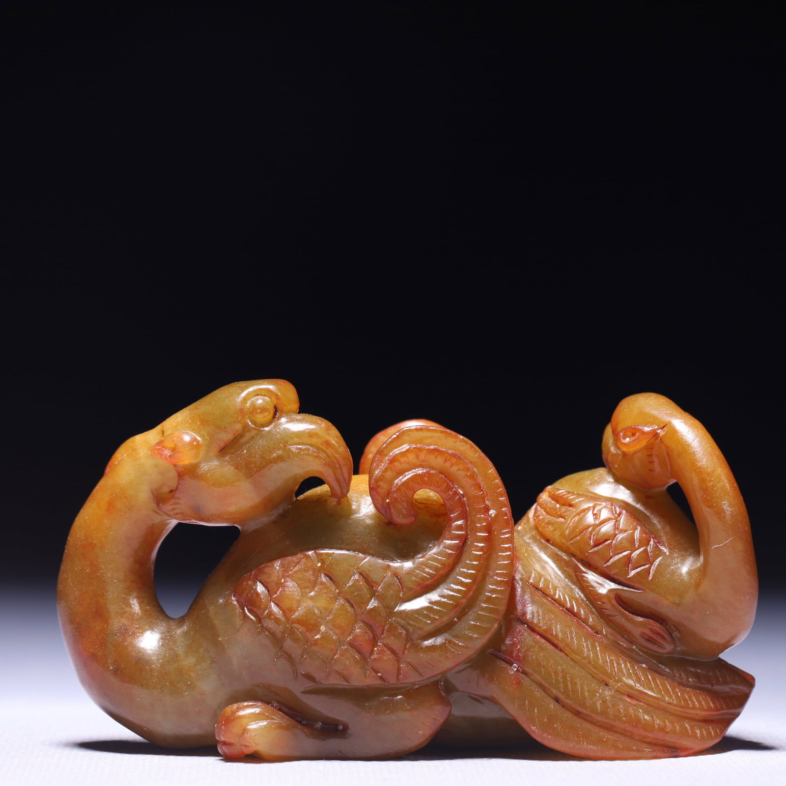 An Exquisite Archaic Jade Phoenix Ornament: An Exquisite Archaic Jade Phoenix Ornament,Ancient Time,China,Size:3.9inx1.2inx2.2in,Weight:239g 高古玉凤摆件,中国远古时期
