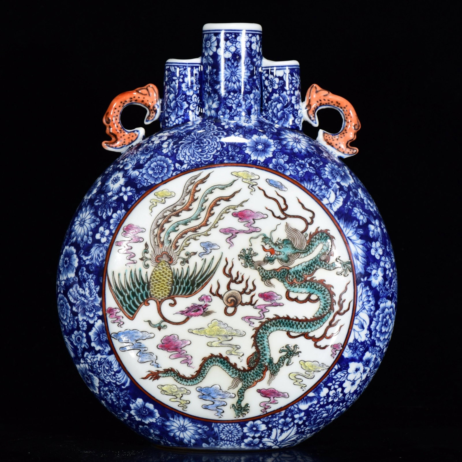 An Exquisite Blue and White Famille-Rose Dragon and Phoenix Pattern Double-Ears Vase: An Exquisite Blue and White Famille-Rose Dragon and Phoenix Pattern Double-Ears Vase,Qing Dynasty,China,Qianlong Six-character Mark,Size:10.6inx8.7in 青花粉彩龙凤&#