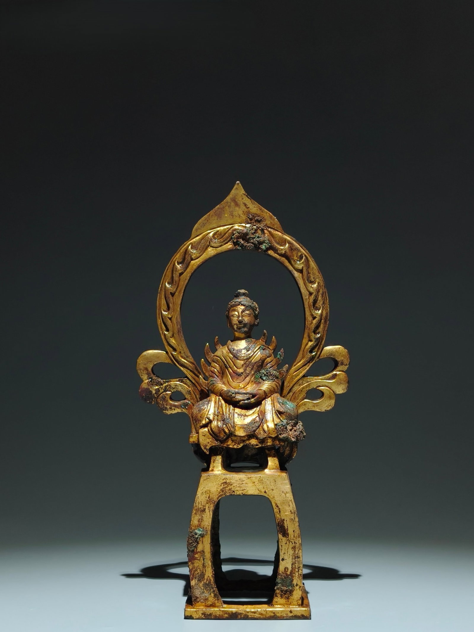 A Solemn Gilt Bronze Buddha Statue Ornament: A Solemn Gilt Bronze Buddha Statue Ornament,The Northern and Southern Dynasties,China,Size:11.2inx5.7inx3in 铜鎏金佛像摆件,中国南北