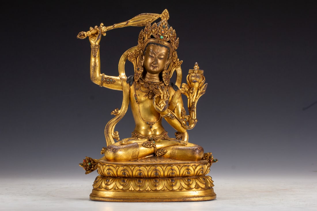 A Solemn Gilt Bronze Statue of Manjusri: A Solemn Gilt Bronze Statue of Manjusri,Qing Dynasty,China,Qianlong Mark,Size:7.1inx4.5inx10.6in,Weight:3000g 铜鎏金文殊菩萨像,中国清&