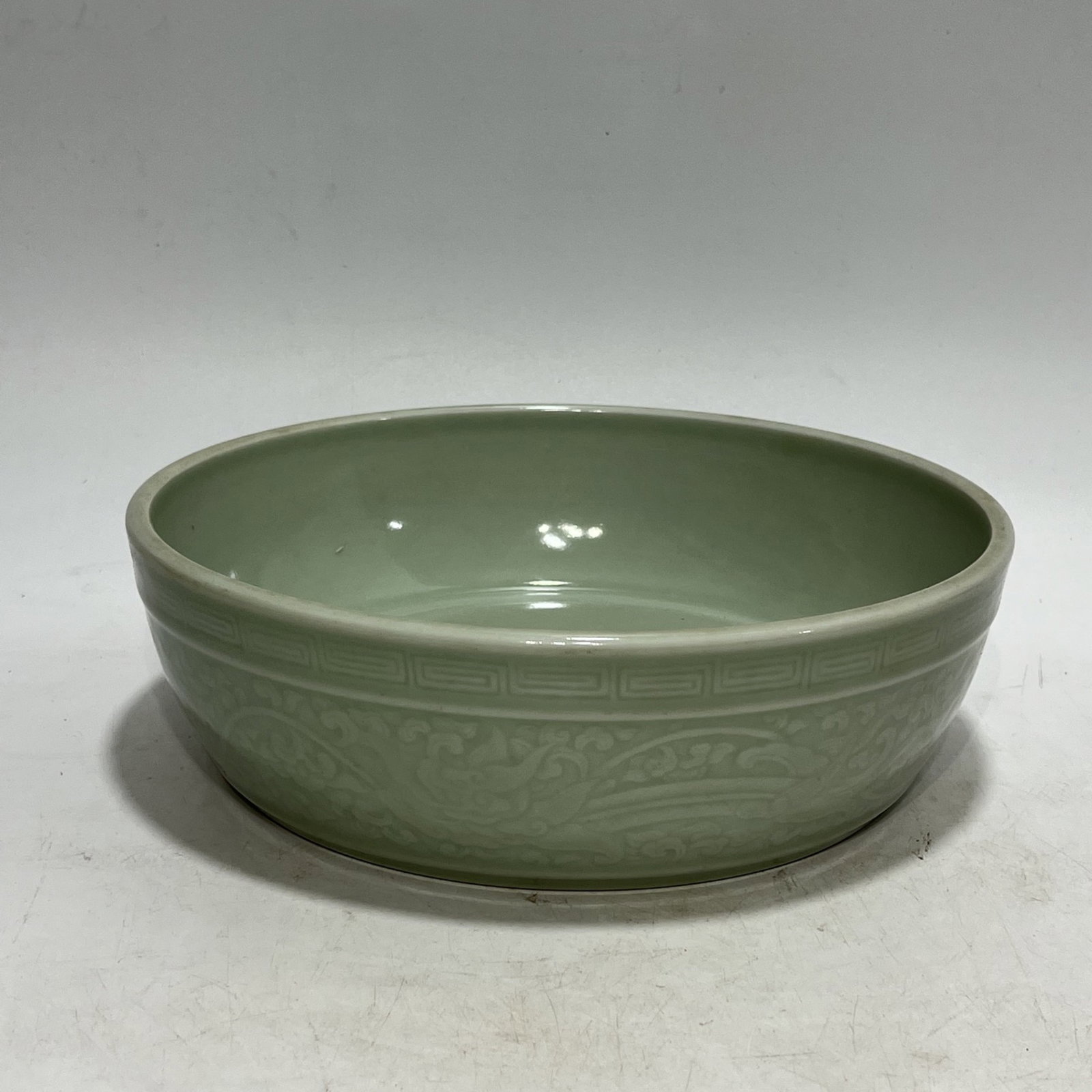 An Exquisite Celadon Glazed Chi-Dragon Pattern Basin: An Exquisite Celadon Glazed Chi-Dragon Pattern Basin,Qing Dynasty,China,Size:9.2in 青釉螭龙纹盆,中国清代