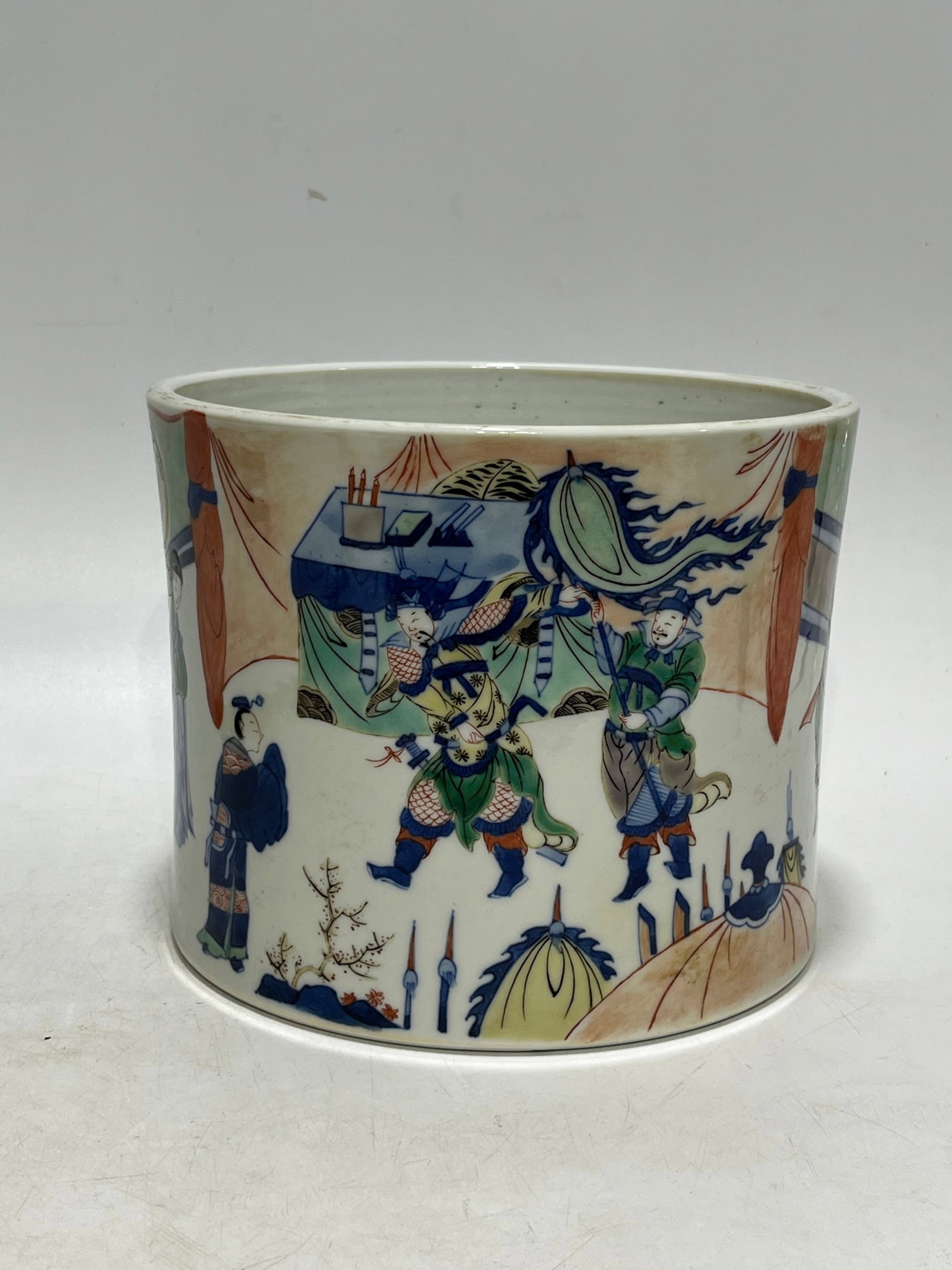 An Exquisite Blue and White Wucai Character and Story Pattern Brush Pot: An Exquisite Blue and White Wucai Character and Story Pattern Brush Pot,Qing Dynasty,China,Kangxi Six-character Mark,Size:6.3in 青花五彩人物故事纹