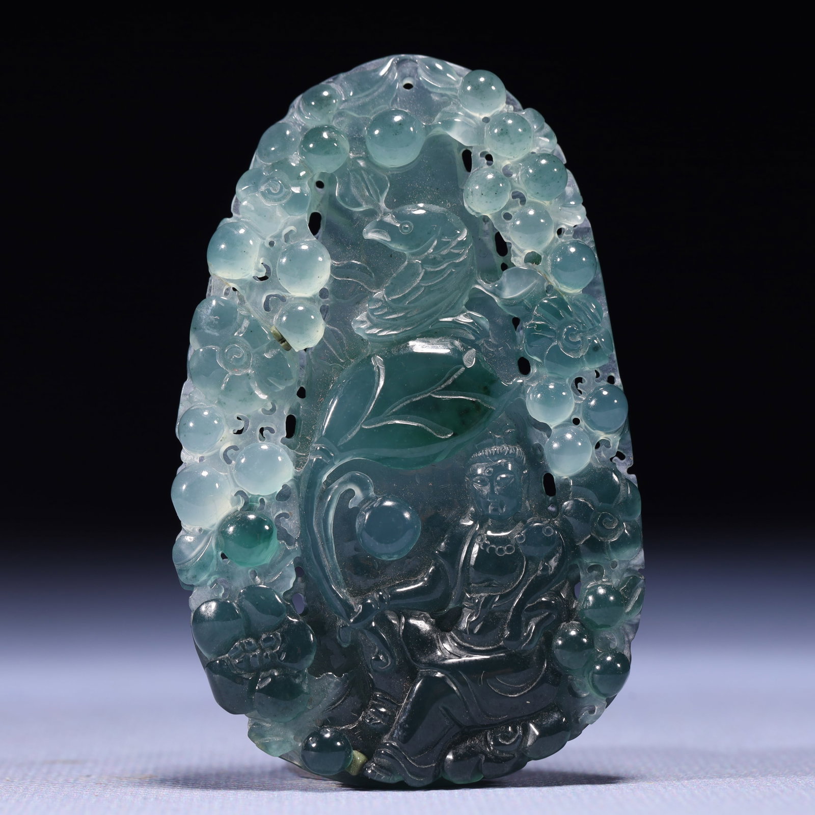 An Exquisite Jadeite Statue of Avalokitesvara Pendant: An Exquisite Jadeite Statue of Avalokitesvara Pendant,Qing Dynasty,China,Size:1.8inx0.2inx2.8in,Weight:40g 翡翠观音像挂件,中国清代