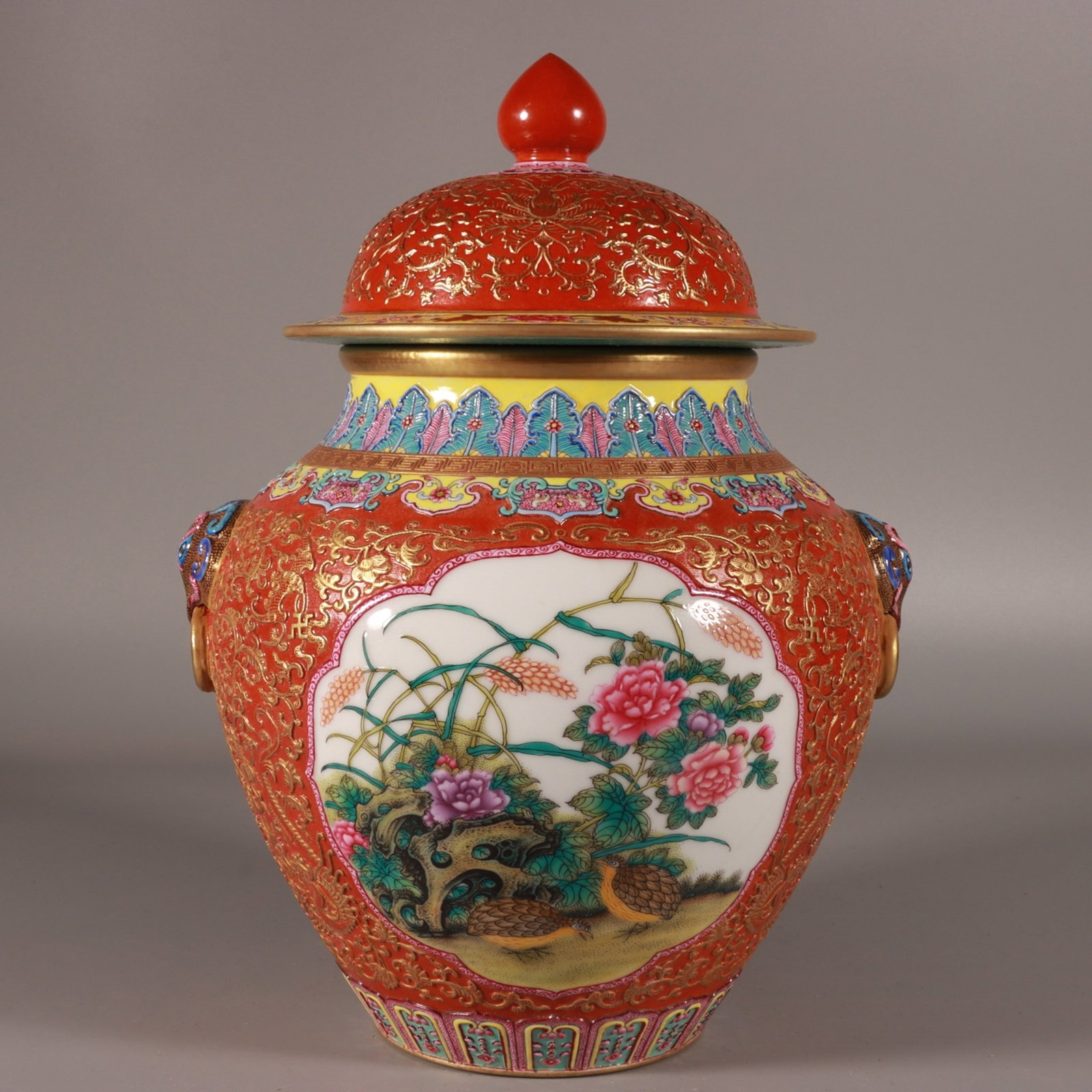 An Exquisite Enamel Iron-Red Painted Gold Flower and Bird Pattern Lion-Ears Jar with Cover: An Exquisite Enamel Iron-Red Painted Gold Flower and Bird Pattern Lion-Ears Jar with Cover,Qing Dynasty,China,Qianlong Six-character Mark,Size:11.4inx7.9in 珐琅彩矾红