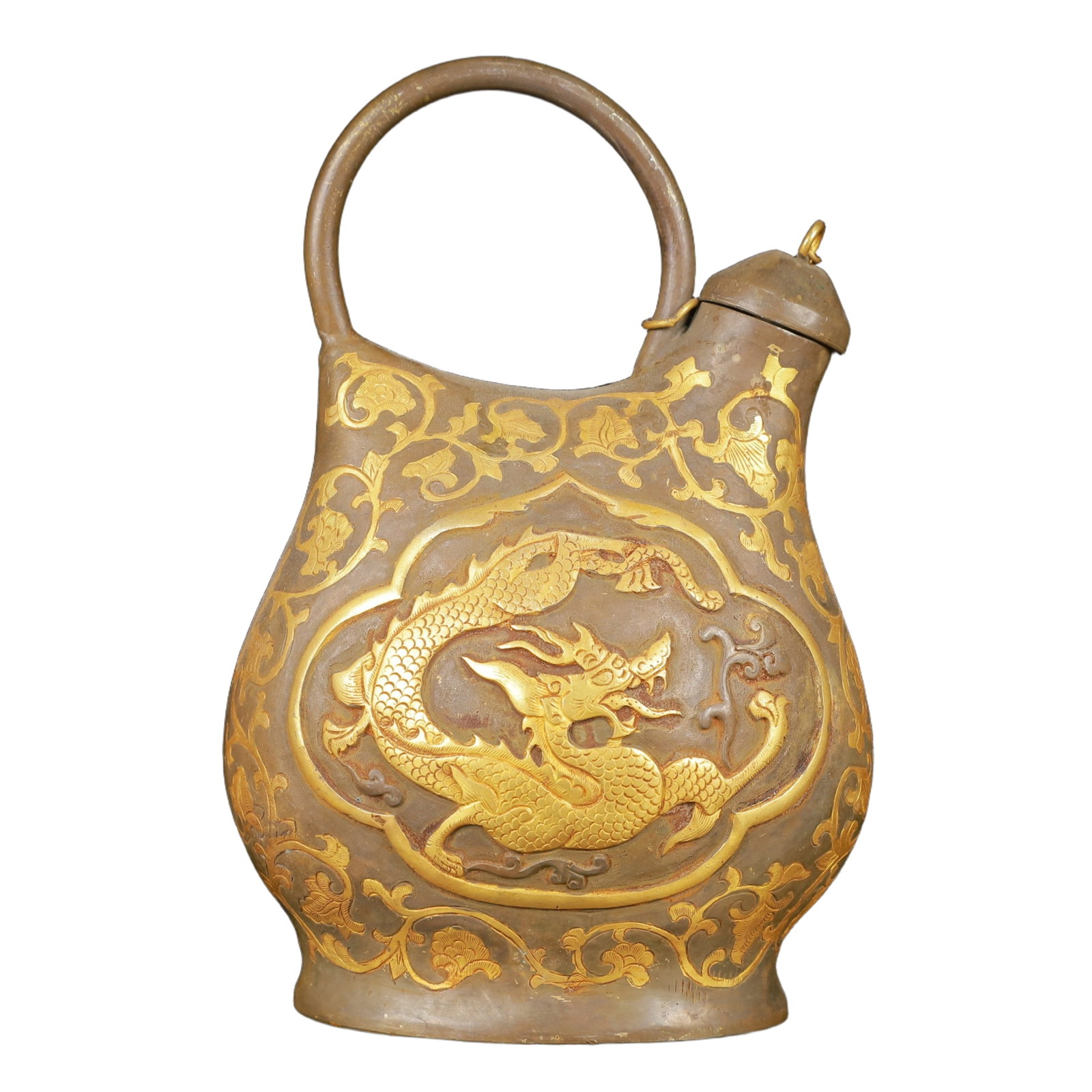 An Exquisite Gilt Silver Dragon Pattern Ewer: An Exquisite Gilt Silver Dragon Pattern Ewer,Tang Dynasty,China,Zhenguan Four-Character Mark,Size:4.3inx2.8inx6.3in,Weight:500g 银鎏金龙纹提壶,中国