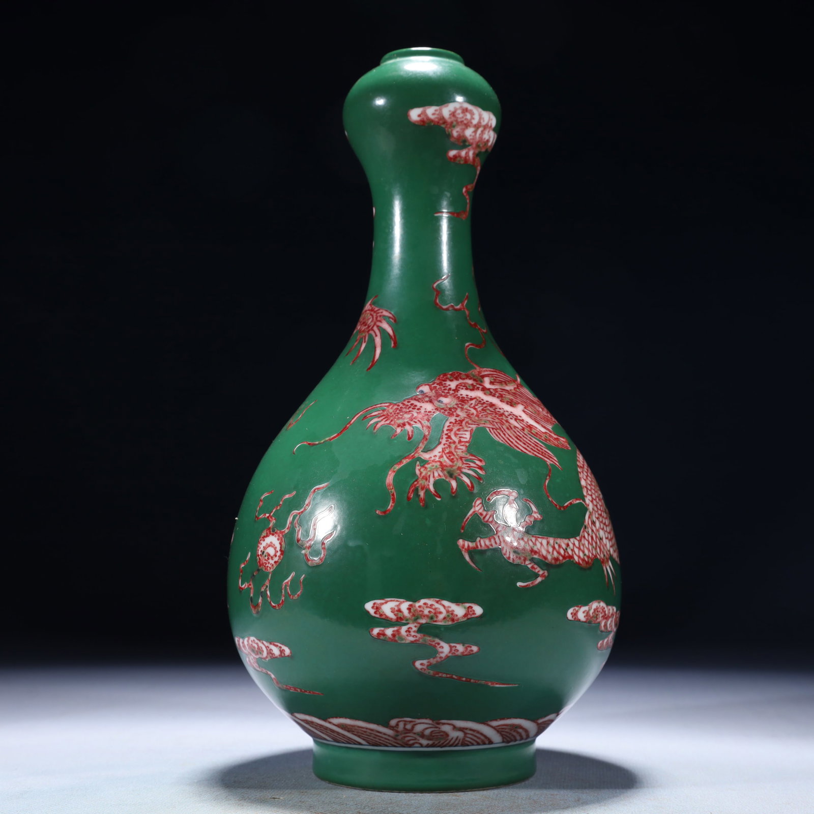 An Exquisite Green Ground Red Glazed Auspicious Cloud and Dragon Pattern Vase: An Exquisite Green Ground Red Glazed Auspicious Cloud and Dragon Pattern Vase,Qing Dynasty,China,Kangxi Six-character Mark,Size:4.7inx9.8in,Weight:900g 绿地红釉祥云