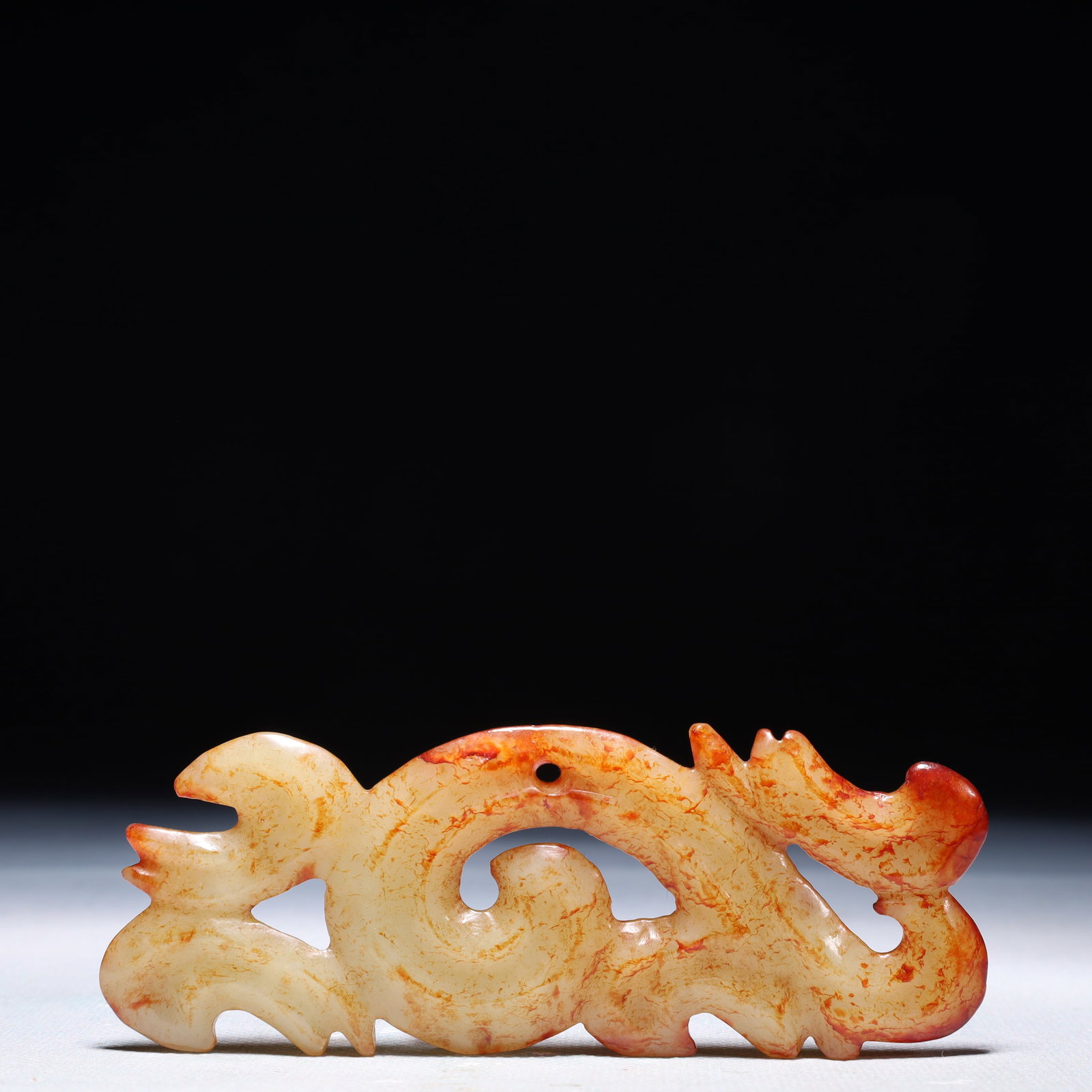 An Archaic Hongshan Culture White Jade Dragon Pendant: An Archaic Hongshan Culture White Jade Dragon Pendant,Ancient Time,China,Size:4.7inx1.6in,Weight:57.4g