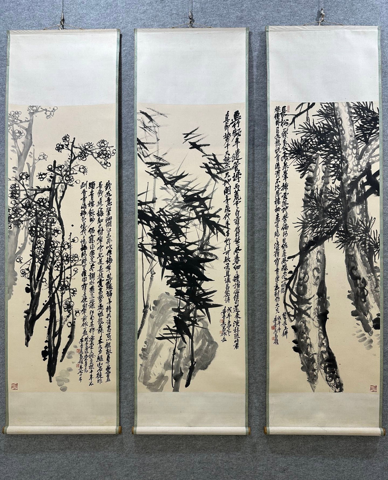 A Set of Chinese Vertical Scroll Ink Painting of Pine,Bamboo and Plum Blossom on Paper: A Set of Chinese Vertical Scroll Ink Painting of Pine,Bamboo and Plum Blossom on Paper,Wu Changshuo,Size:52.4inx19.7in*3