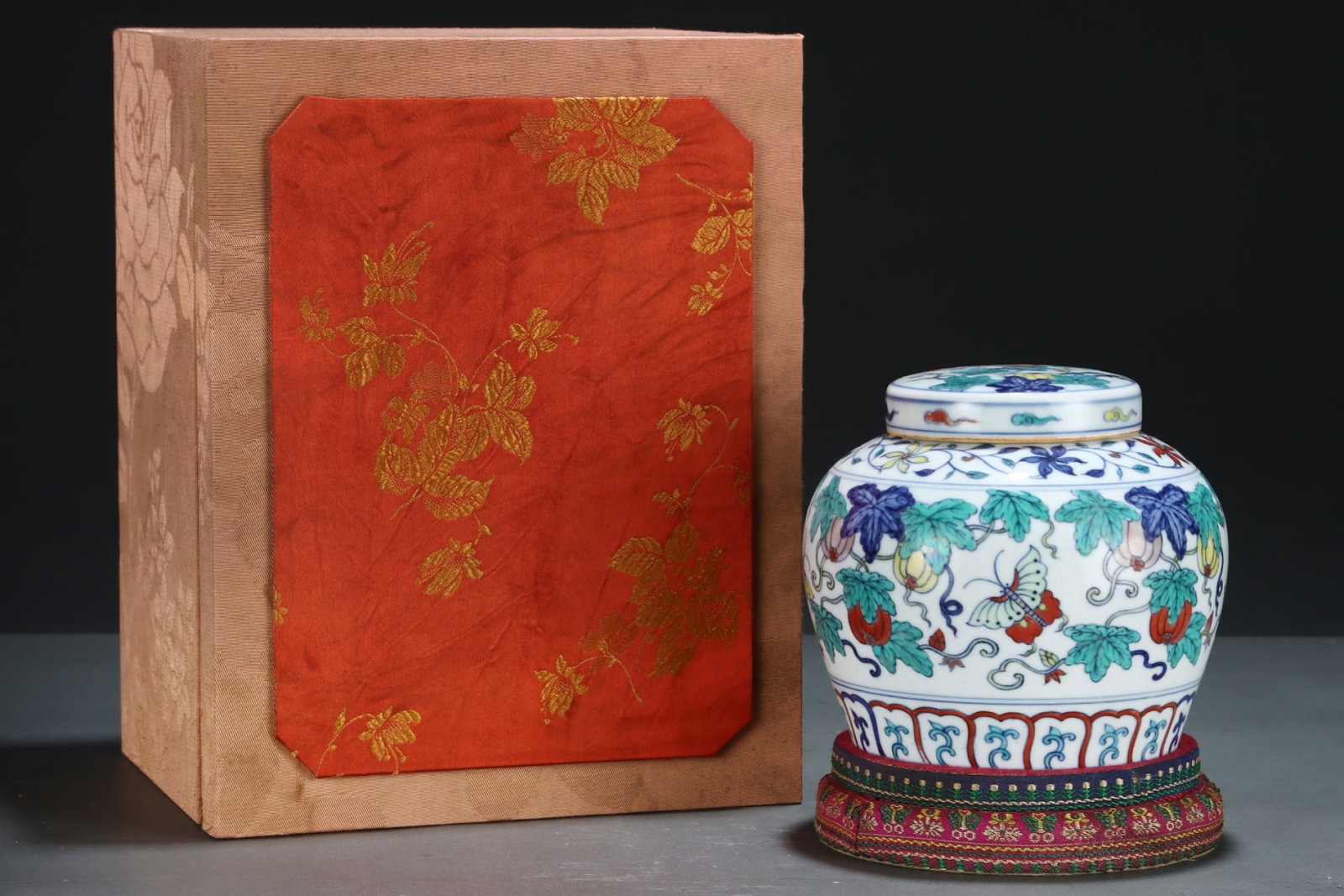 An Exquisite Doucai Flower and Butterfly Pattern Jar with Cover: An Exquisite Doucai Flower and Butterfly Pattern Jar with Cover,Ming Dynasty,China,Size:5.1inx5.8in