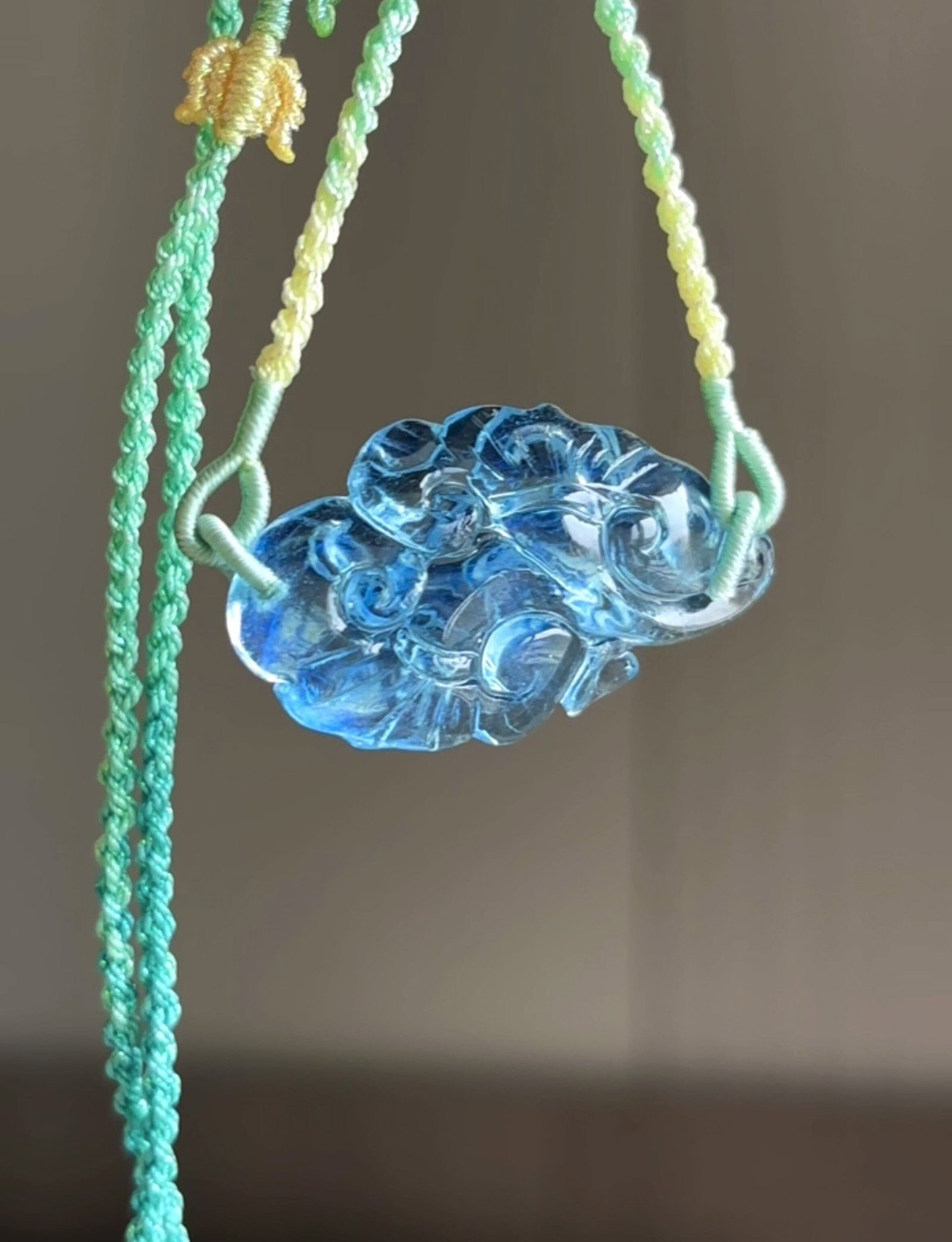An Exquisite Aquamarine Ruyi Necklace: An Exquisite Aquamarine Ruyi Necklace,Size:1.3inx0.8inx0.3in,Weight:6.3g 海蓝宝如意吊坠