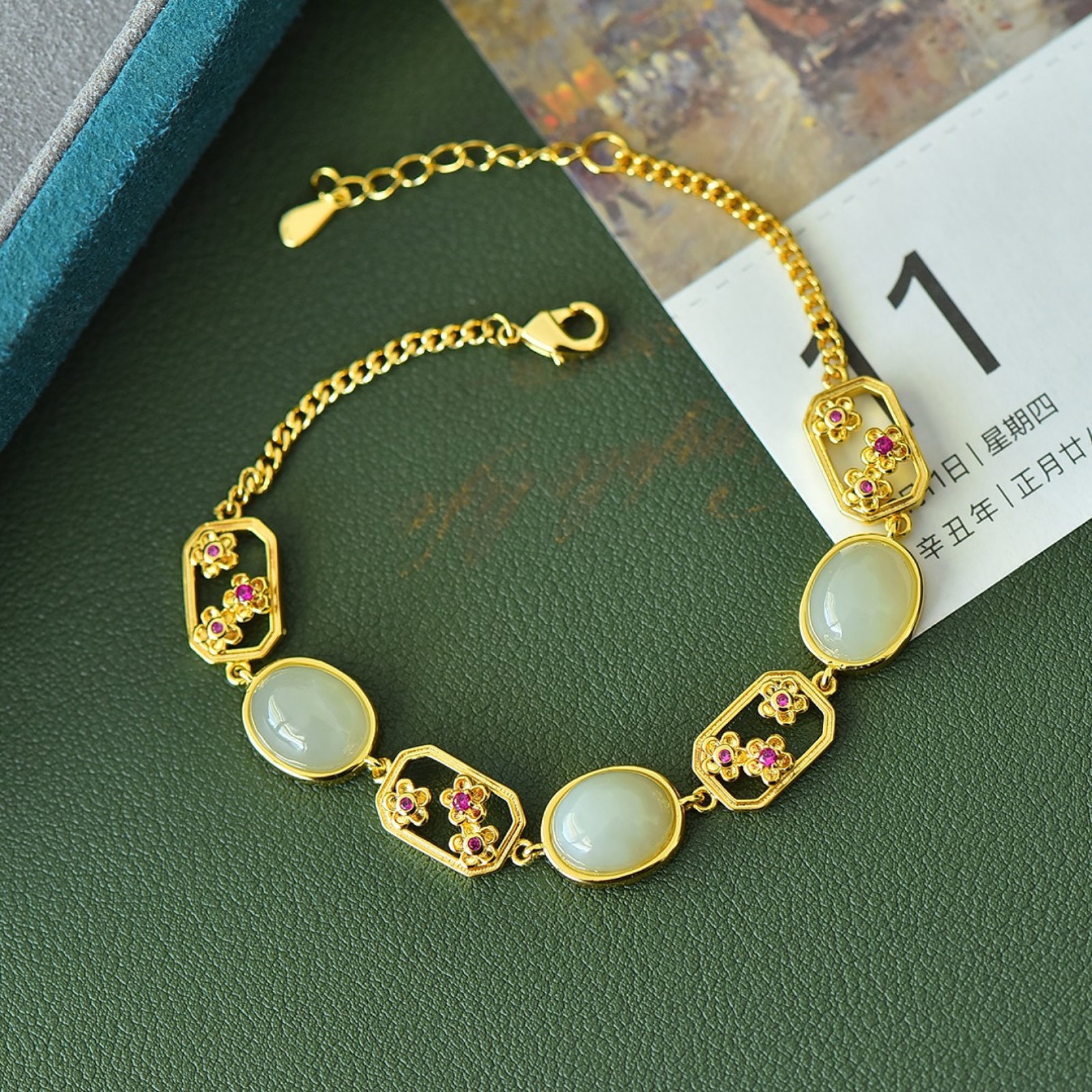 An Exquisite Bronze-Gold Plated Inlaid White Jade Bracelet: An Exquisite Bronze-Gold Plated Inlaid White Jade Bracelet,Size:0.3inx0.4in 铜镀金镶白玉手链