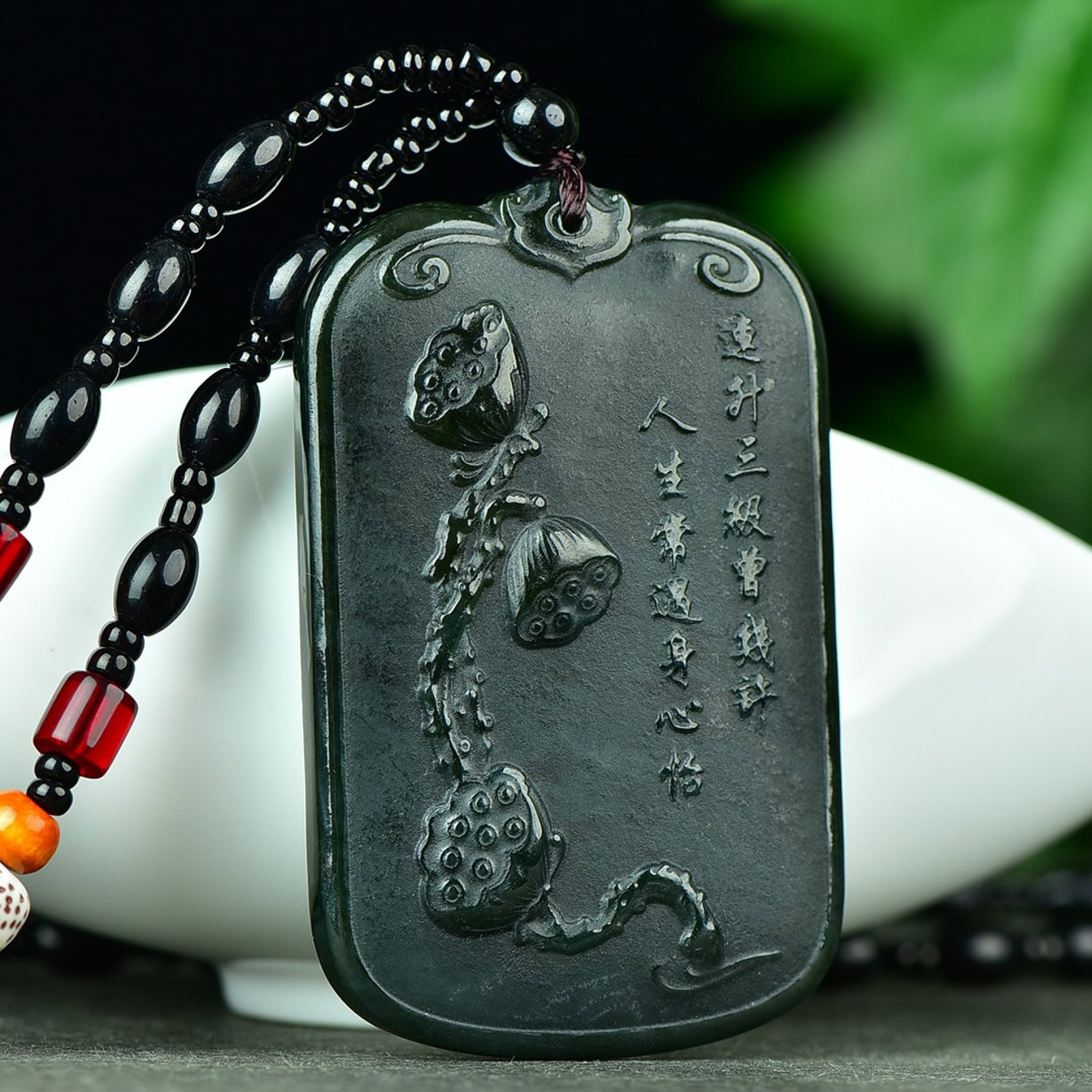 An Exquisite Sapphire Flower and Bird Pattern Pendant,With Poem: An Exquisite Sapphire Flower and Bird Pattern Pendant,With Poem,Size:1.5inx2.5in 寓意:吉祥 年年有余 青玉花鸟纹吊