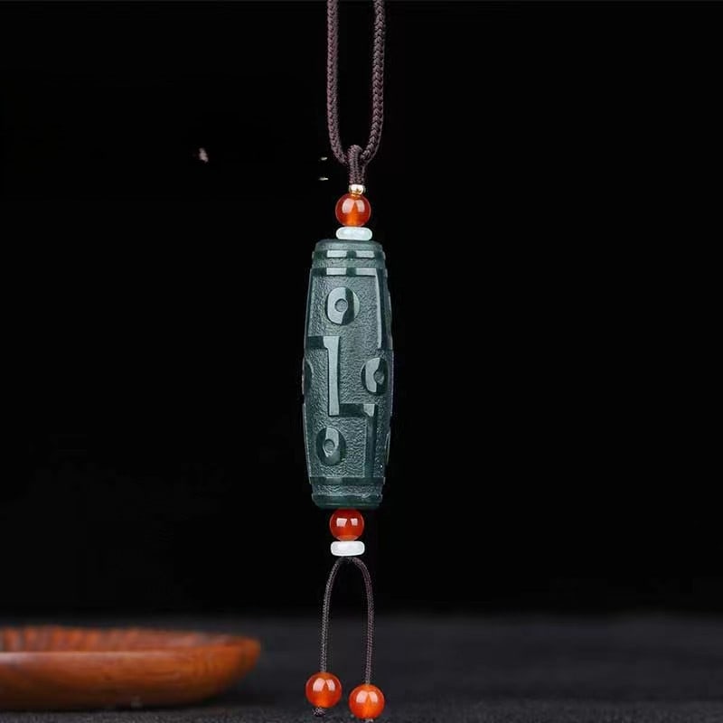 An Exquisite Cyan jade Dzi Bead Pendant: An Exquisite Cyan jade Dzi Bead Pendant,Size:0.6inx1.9in 青玉天珠挂件